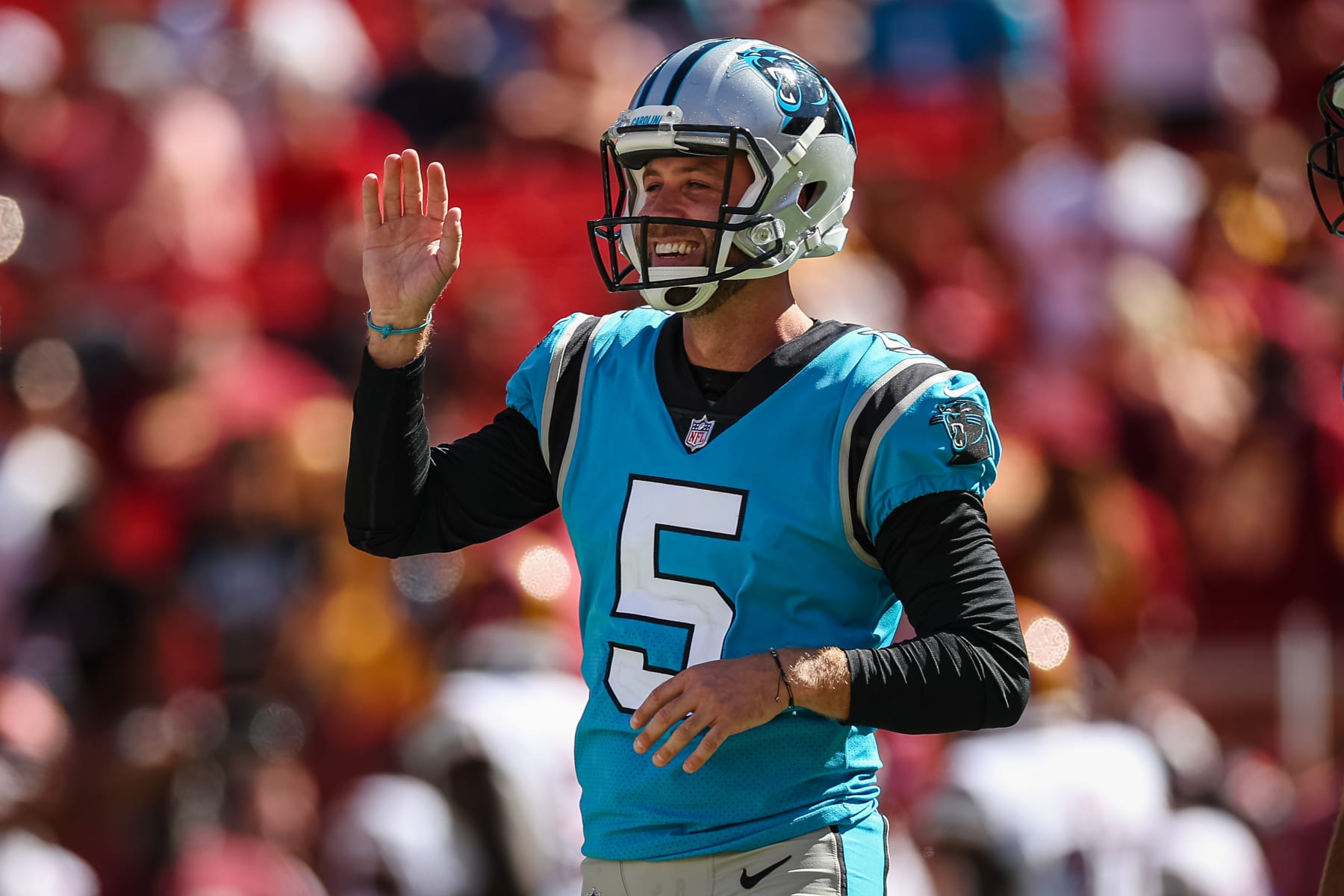 LANDOVER, MD - AUGUST 13: Zane Gonzalez #5 of the Carolina Panthers celebrates after kicking the game winning field goal against the Washington Commanders during the second half of the preseason game at FedExField on August 13, 2022 in Landover, Maryland. (Photo by Scott Taetsch/Getty Images)