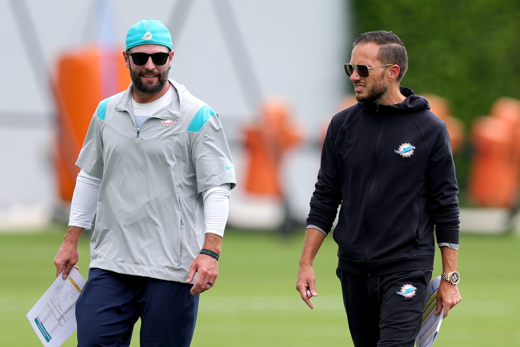MIAMI GARDENS, FLORIDA - JUNE 07: Wide receivers coach Wes Welker and head coach Mike McDaniel of the Miami Dolphins speak on the field during practice at Baptist Health Training Complex on June 07, 2023 in Miami Gardens, Florida. (Photo by Megan Briggs/Getty Images)
