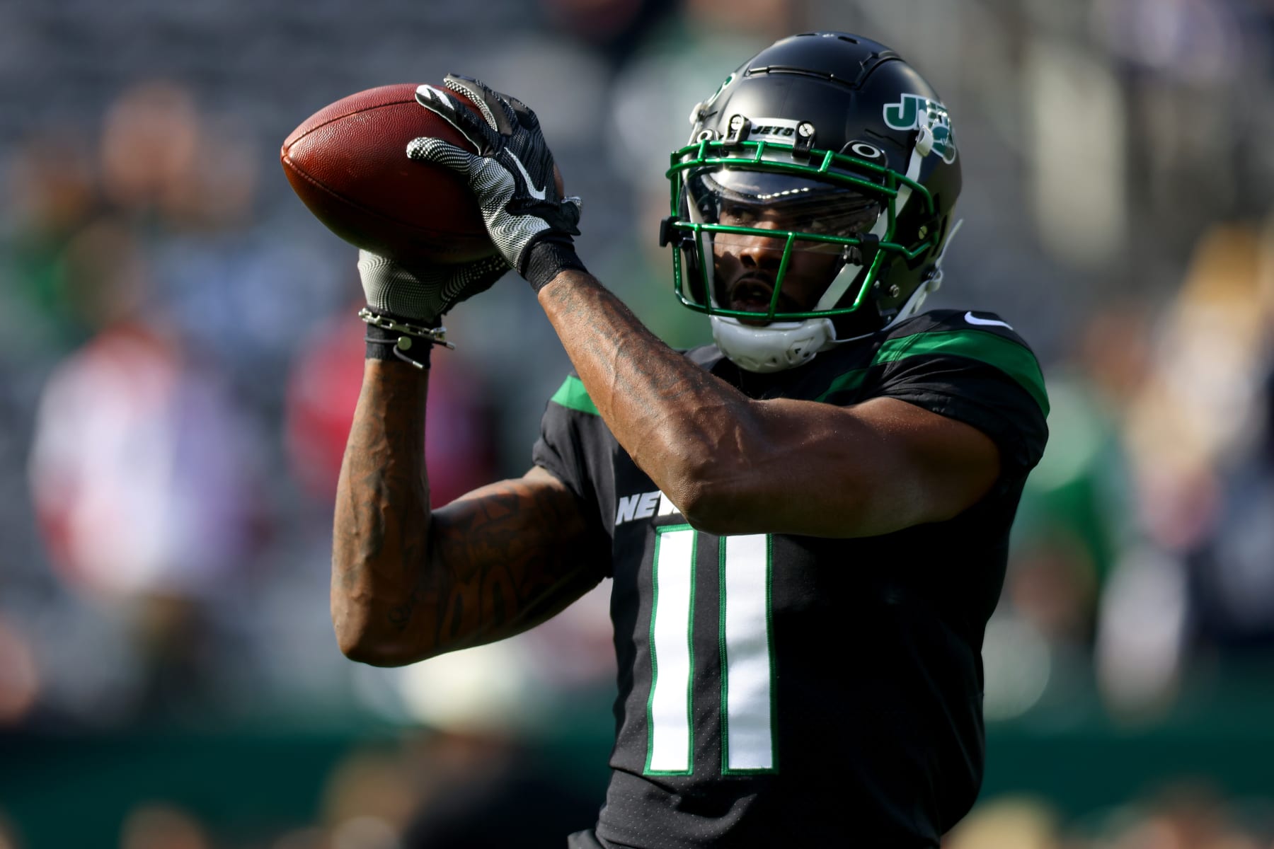 EAST RUTHERFORD, NEW JERSEY - OCTOBER 30: Denzel Mims #11 of the New York Jets warms up before a game a at MetLife Stadium on October 30, 2022 in East Rutherford, New Jersey. (Photo by Mike Stobe/Getty Images) EAST RUTHERFORD, NEW JERSEY - OCTOBER 30: Denzel Mims #11 of the New York Jets warms up before a game a at MetLife Stadium on October 30, 2022 in East Rutherford, New Jersey. (Photo by Mike Stobe/Getty Images)