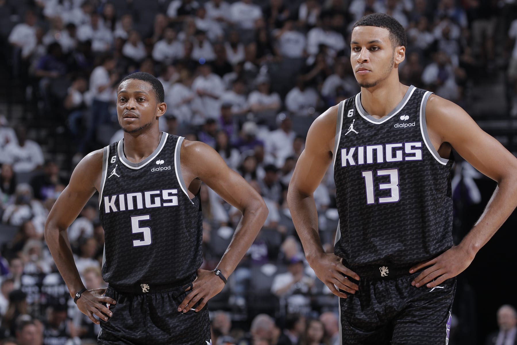 SACRAMENTO, CA - APRIL 30: Keegan Murray #13 and De'Aaron Fox #5 of the Sacramento Kings look on during the game against the Golden State Warriors during Round 1 Game 7 of the 2023 NBA Playoffs on April 30, 2023 at Golden 1 Center in Sacramento, California. NOTE TO USER: User expressly acknowledges and agrees that, by downloading and or using this photograph, User is consenting to the terms and conditions of the Getty Images Agreement. Mandatory Copyright Notice: Copyright 2023 NBAE (Photo by Rocky Widner/NBAE via Getty Images)