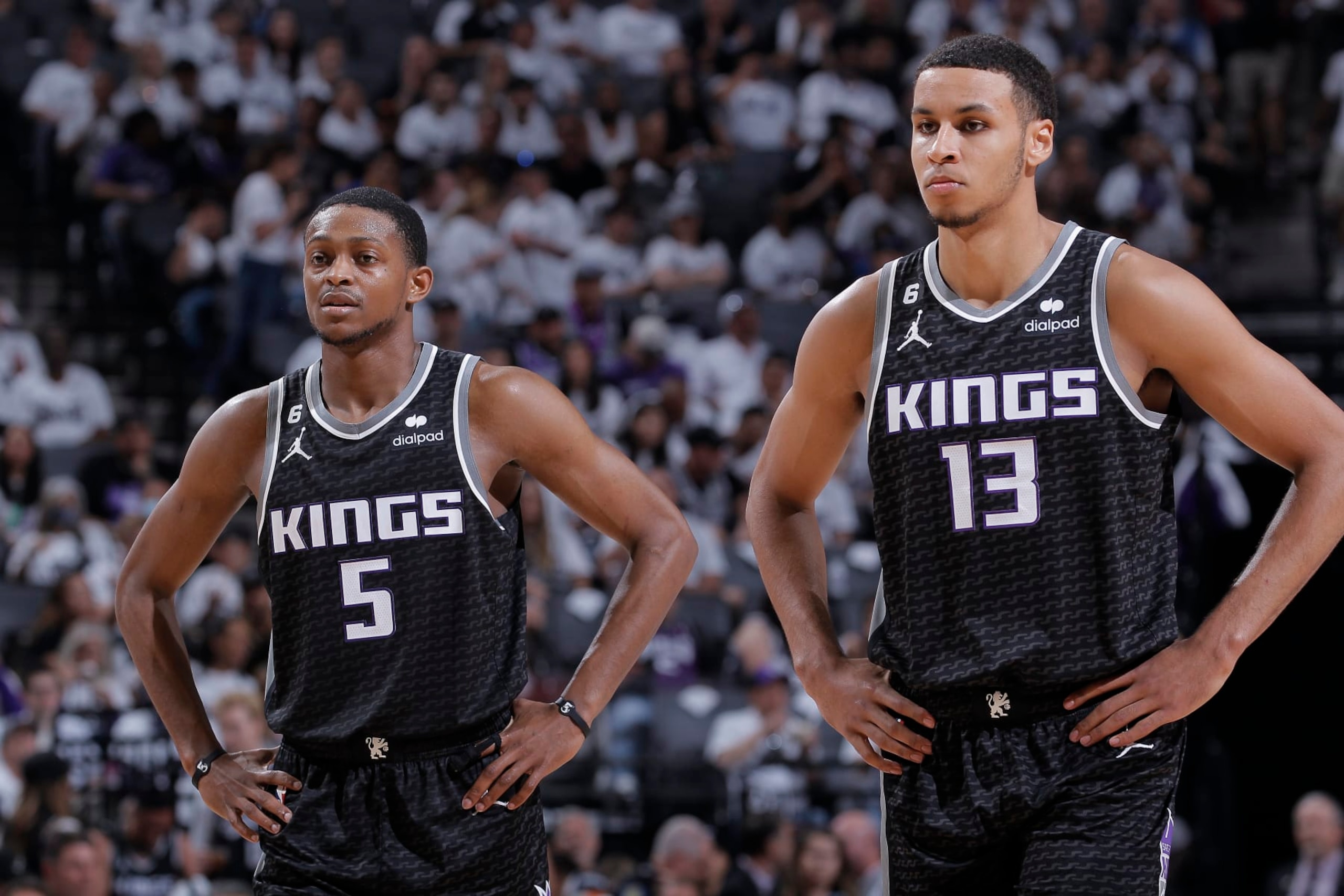 SACRAMENTO, CA - APRIL 30: Keegan Murray #13 and De'Aaron Fox #5 of the Sacramento Kings look on during the game against the Golden State Warriors during Round 1 Game 7 of the 2023 NBA Playoffs on April 30, 2023 at Golden 1 Center in Sacramento, California. NOTE TO USER: User expressly acknowledges and agrees that, by downloading and or using this photograph, User is consenting to the terms and conditions of the Getty Images Agreement. Mandatory Copyright Notice: Copyright 2023 NBAE (Photo by Rocky Widner/NBAE via Getty Images)