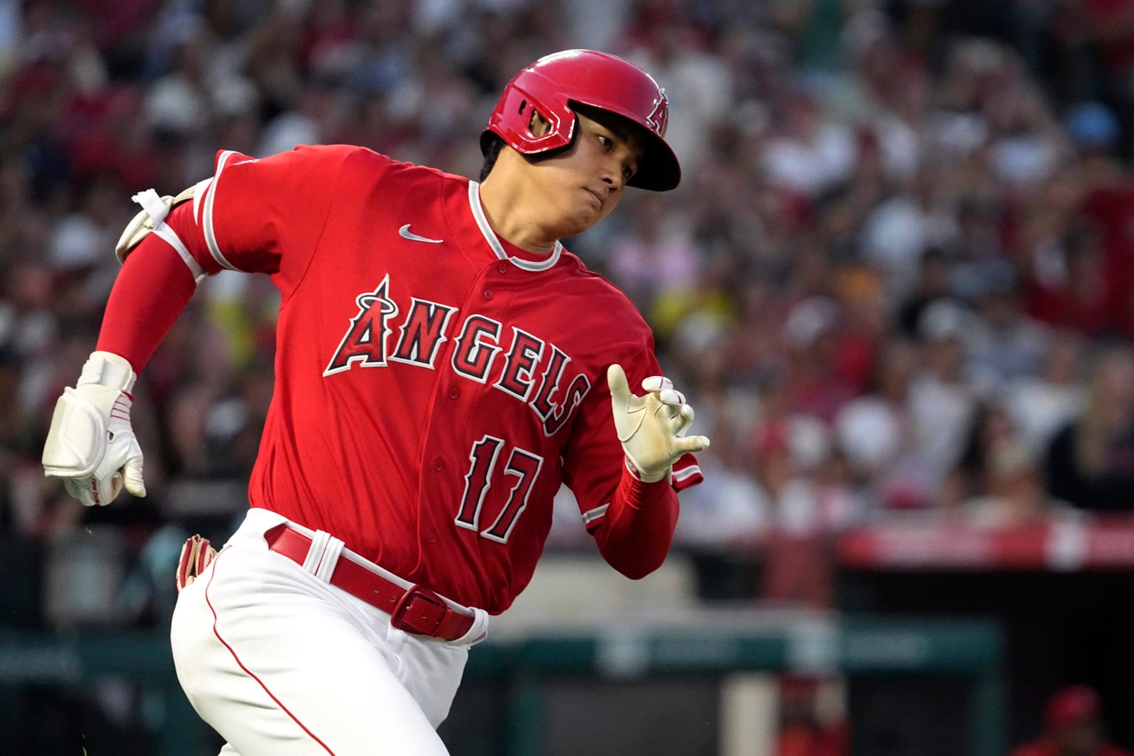 Los Angeles Angels' Shohei Ohtani rounds first on his way to a triple during the fifth inning of a baseball game against the New York Yankees Tuesday, July 18, 2023, in Anaheim, Calif. (AP Photo/Mark J. Terrill) Los Angeles Angels' Shohei Ohtani rounds first on his way to a triple during the fifth inning of a baseball game against the New York Yankees Tuesday, July 18, 2023, in Anaheim, Calif. (AP Photo/Mark J. Terrill)