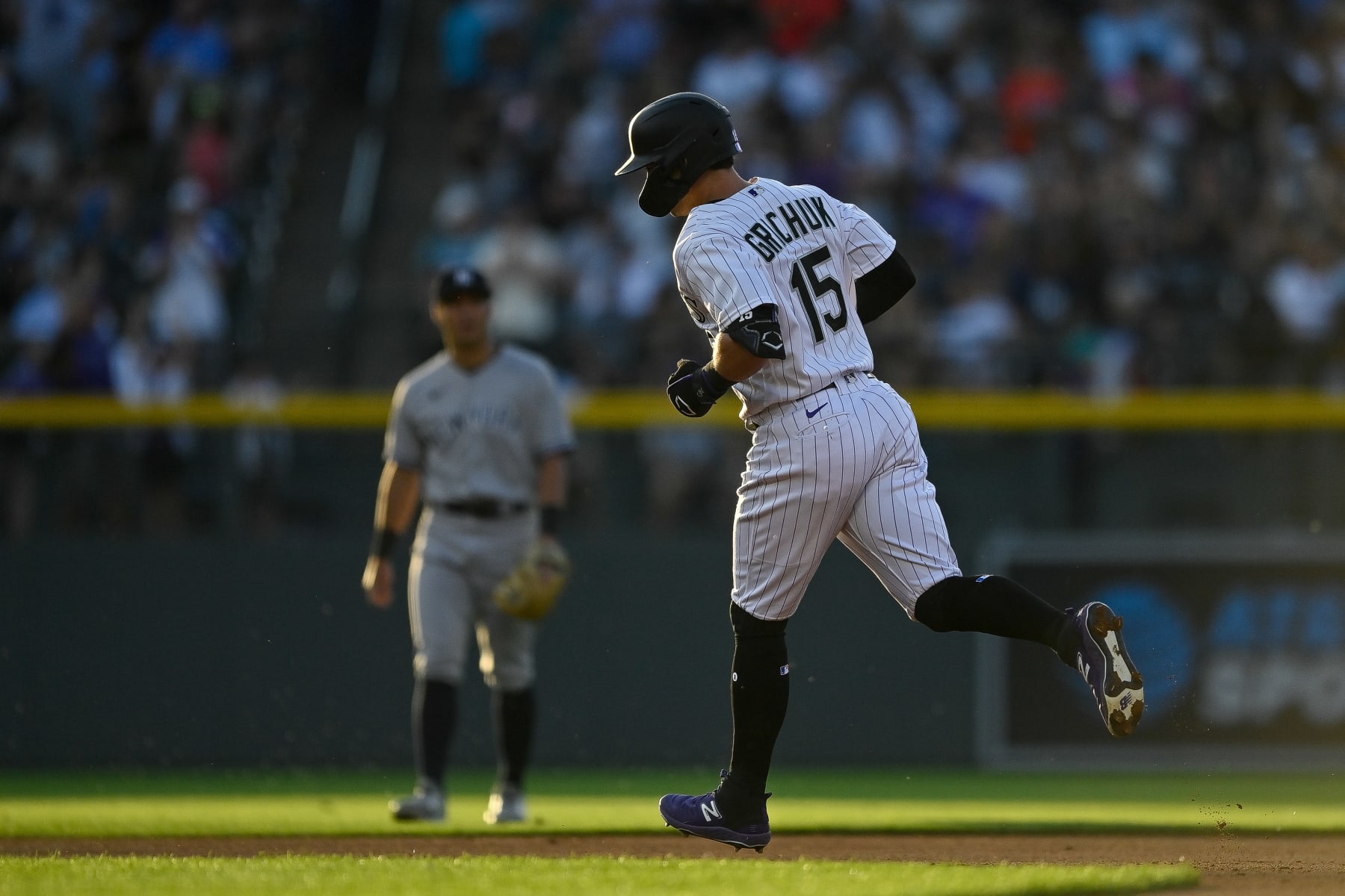 DENVER, CO - JULY 14: Randal Grichuk #15 of the Colorado Rockies rounds the bases after hitting a fourth inning solo homerun in a game against the New York Yankees at Coors Field on July 14, 2023 in Denver, Colorado. (Photo by Dustin Bradford/Getty Images)