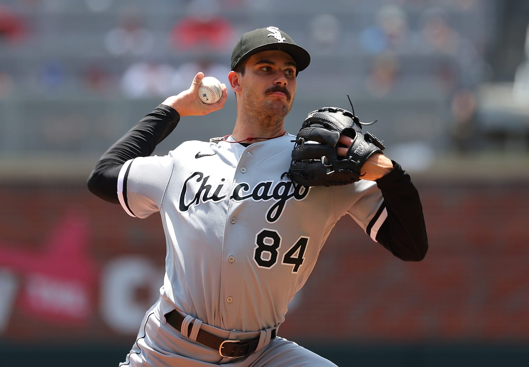 ATLANTA, GEORGIA - JULY 16:  Dylan Cease #84 of the Chicago White Sox pitches in the second inning against the Atlanta Braves at Truist Park on July 16, 2023 in Atlanta, Georgia. (Photo by Kevin C. Cox/Getty Images)