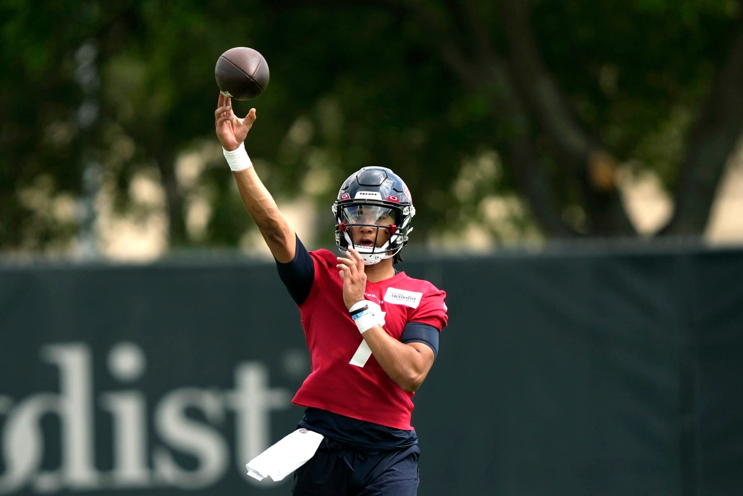 Houston Texans quarterback C.J. Stroud throws a pass during a rookie football minicamp practice Friday, May 12, 2023, in Houston. (AP Photo/David J. Phillip)