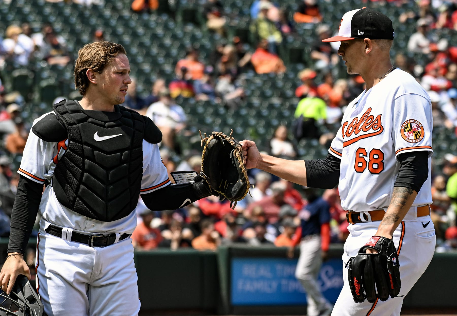 Baltimore's Adley Rutschman (L) and Tyler Wells (R)