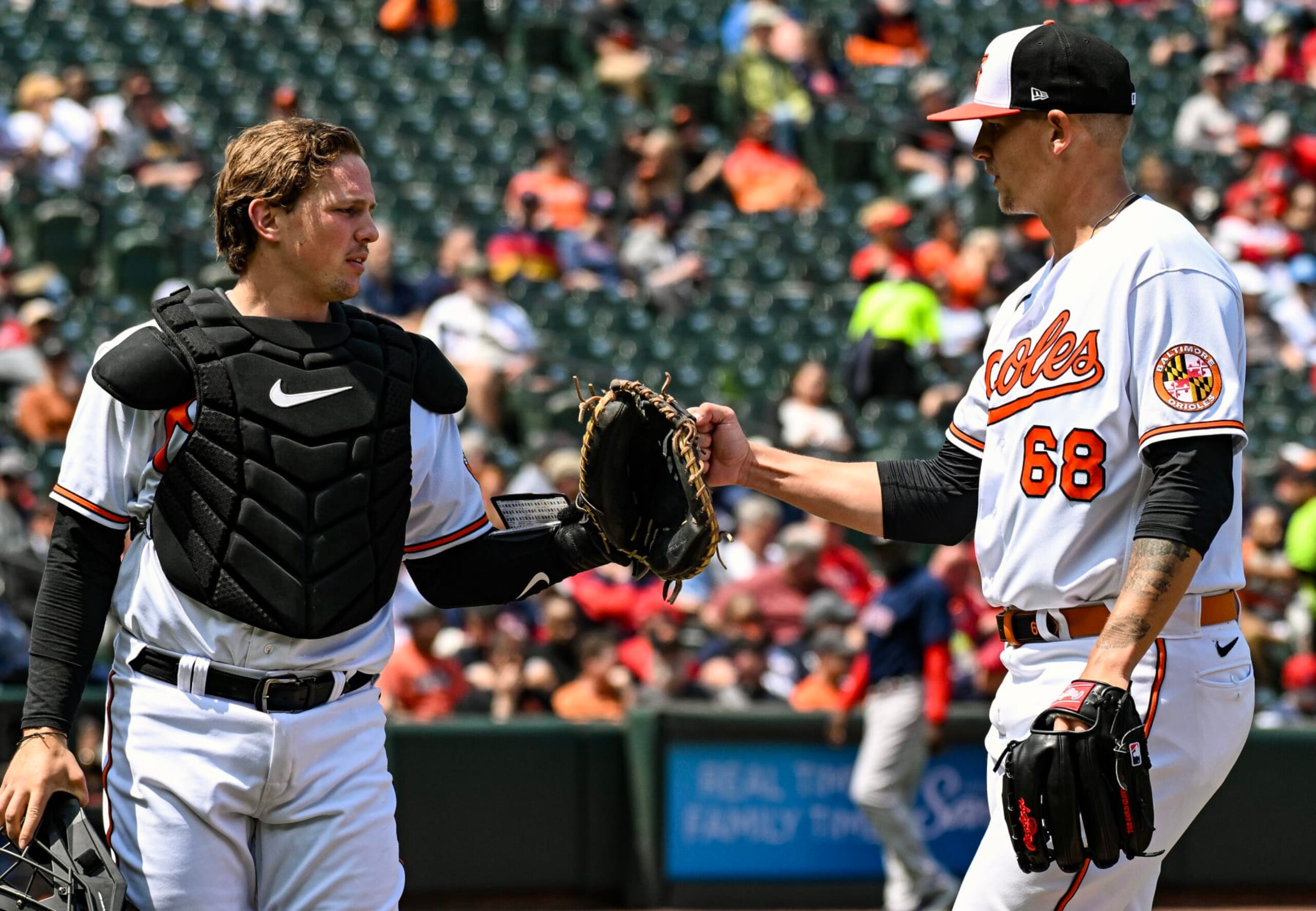 Baltimore's Adley Rutschman (L) and Tyler Wells (R)