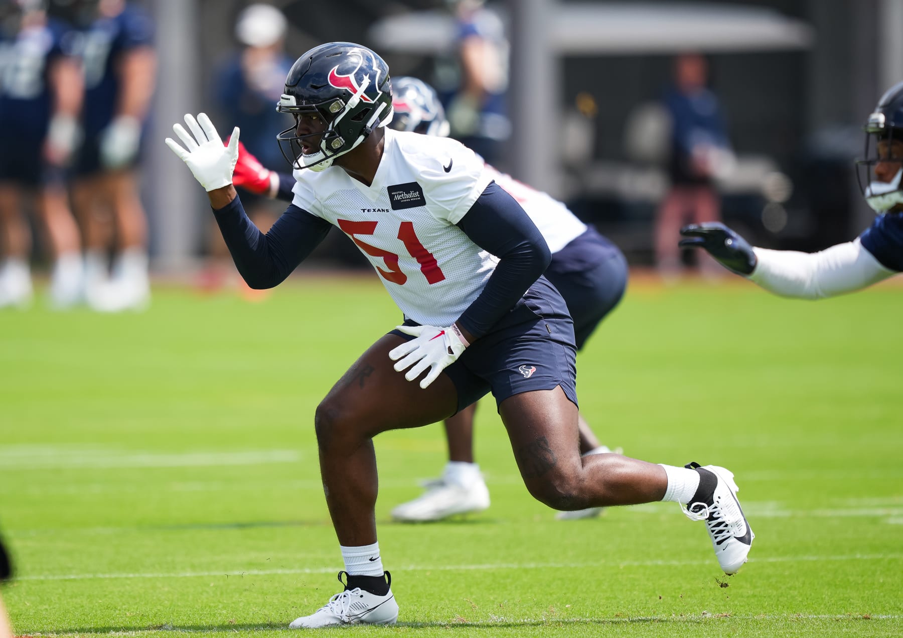 HOUSTON, TEXAS - MAY 12: Linebacker Will Anderson Jr. #51 of the Houston Texans warms up during the first day of Houston Texans Rookie Minicamp at NRG Stadium on May 12, 2023 in Houston, Texas. (Photo by Alex Bierens de Haan/Getty Images)