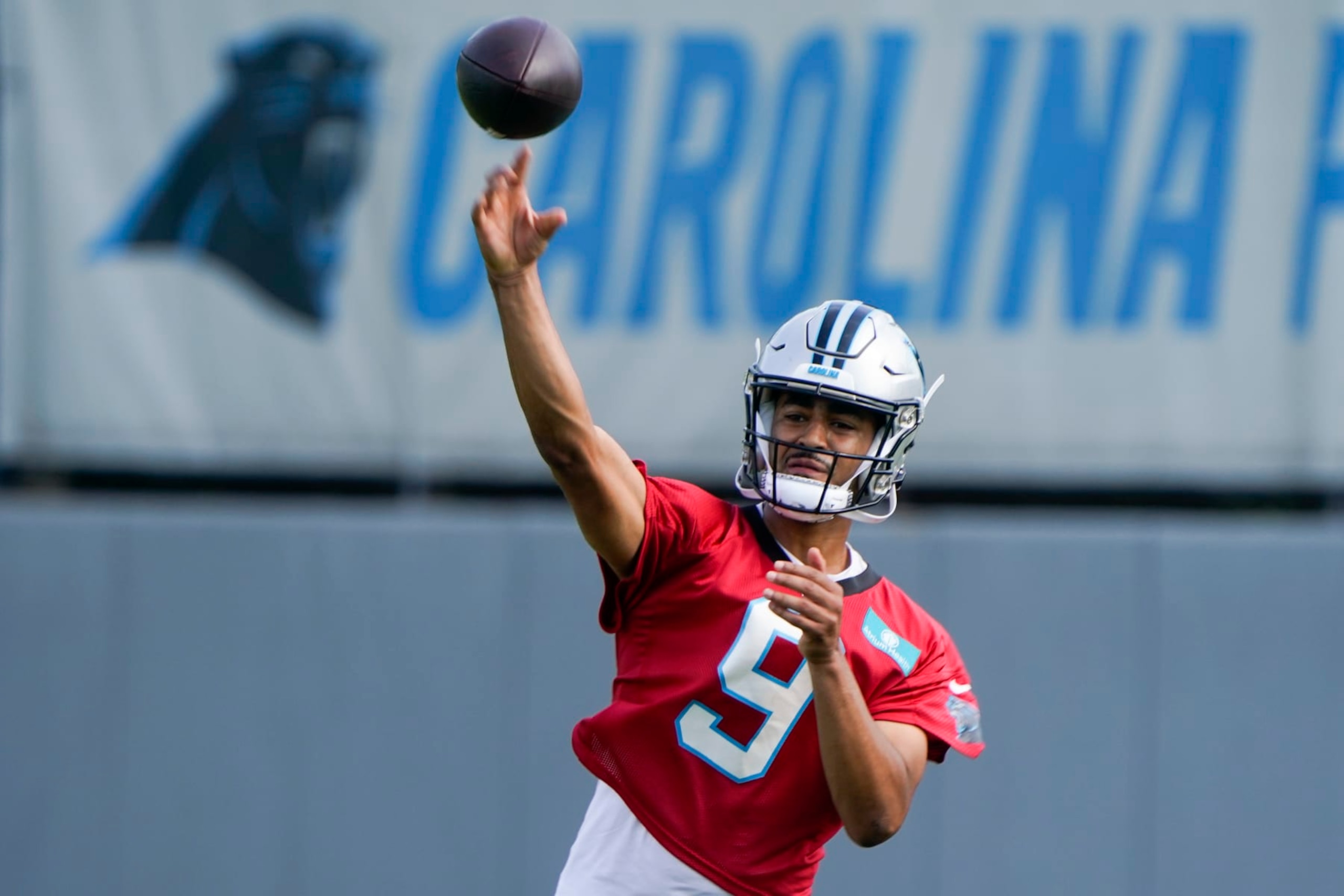 Carolina Panthers quarterback Bryce Young (9) throws a pass during NFL football practice, Thursday, June 1, 2023, in Charlotte, N.C. (AP Photo/Erik Verduzco)