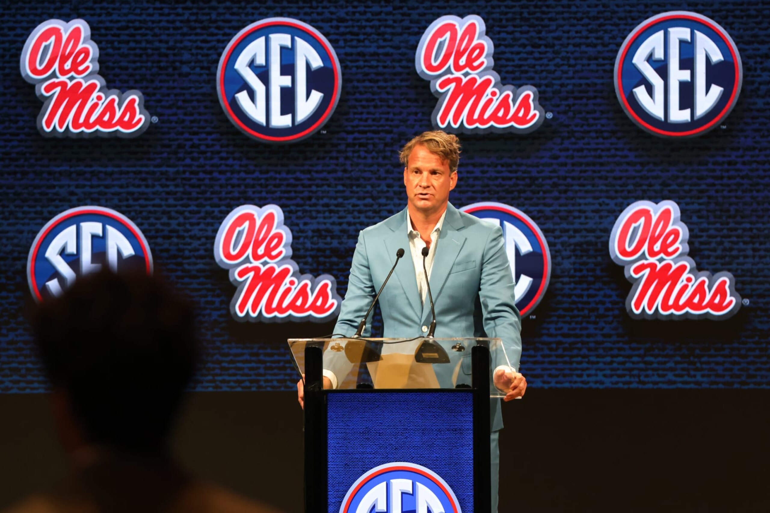 NASHVILLE, TN - JULY 20: Ole Miss Rebels head coach Lane Kiffin listens to a question during Southeastern Conference Football Kickoff Media Day, July 20, 2023 at the Grand Hyatt Nashville in Nashville, Tennessee. (Photo by Matthew Maxey/Icon Sportswire via Getty Images) NASHVILLE, TN - JULY 20: Ole Miss Rebels head coach Lane Kiffin listens to a question during Southeastern Conference Football Kickoff Media Day, July 20, 2023 at the Grand Hyatt Nashville in Nashville, Tennessee. (Photo by Matthew Maxey/Icon Sportswire via Getty Images)