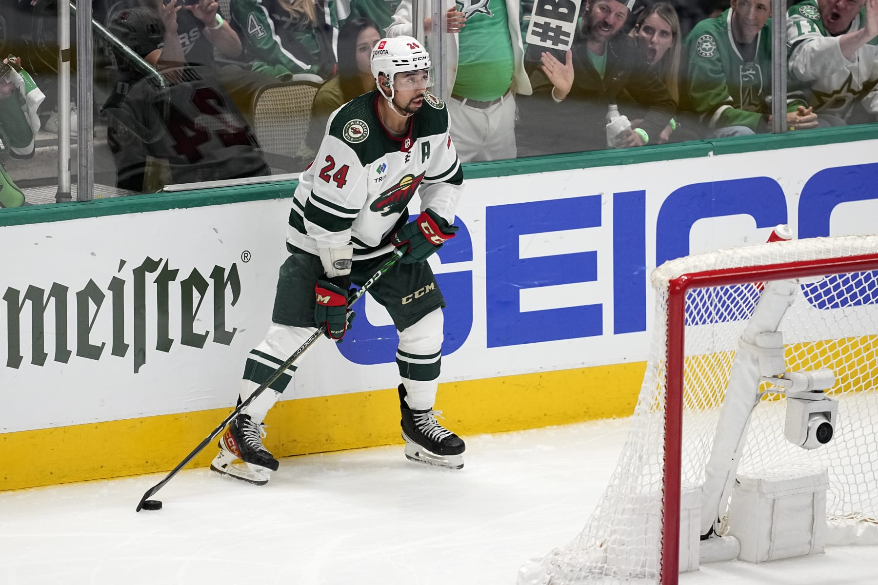 Minnesota Wild defenseman Matt Dumba looks to make a pass during Game 1 of an NHL hockey Stanley Cup first-round playoff series, Tuesday, April 18, 2023, in Dallas. (AP Photo/Tony Gutierrez)