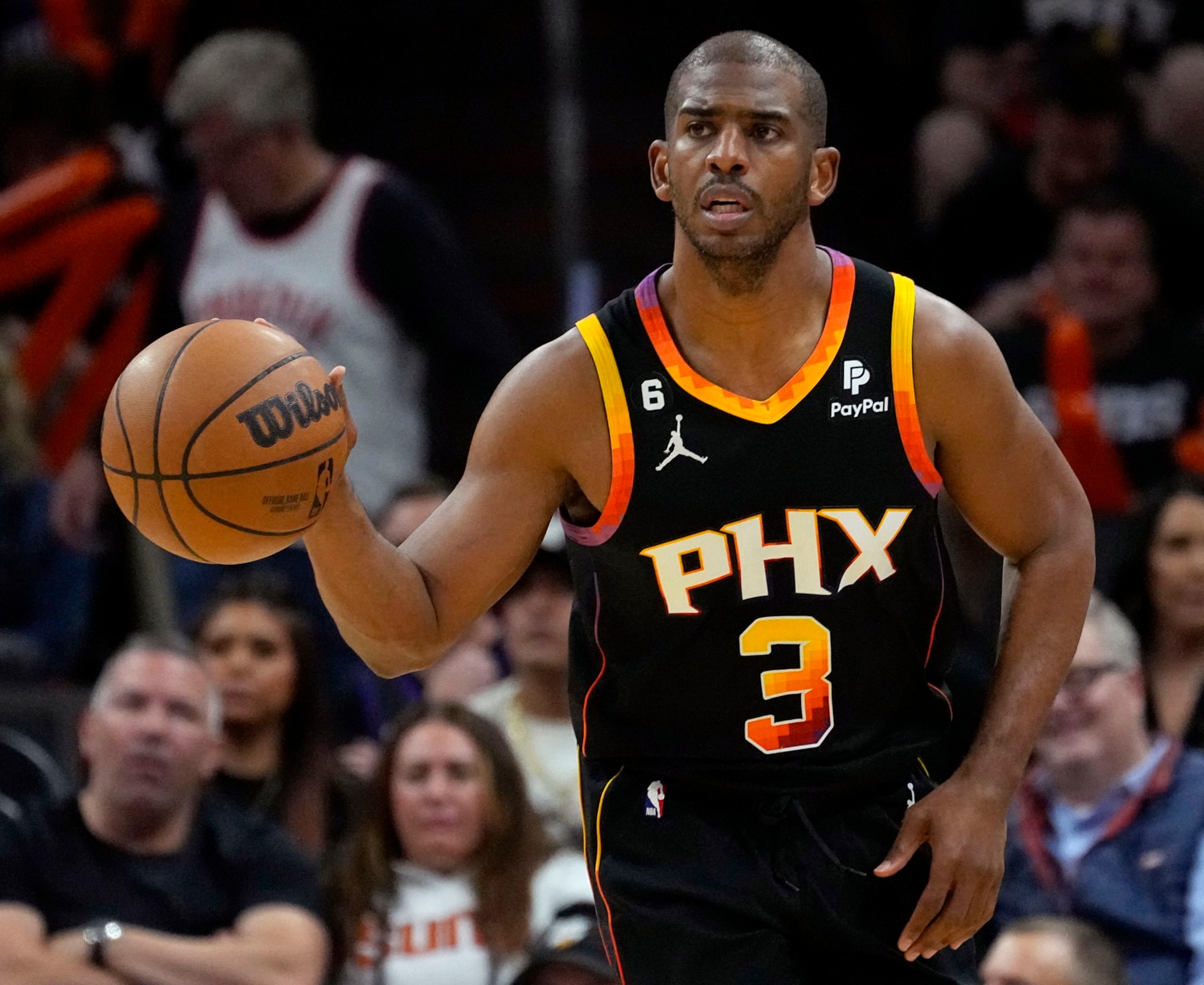 FILE - Phoenix Suns guard Chris Paul moves the ball upcourt against the Los Angeles Clippers during the second half of Game 5 of a first-round NBA basketball playoff series April 25, 2023, in Phoenix. Mat Ishbia’s five-month tenure as the new owner of the Suns has produced a whirlwind of change. Ishbia oversaw his latest big move Sunday, June 18, 2023, when the Suns put together the framework for a trade that would send 12-time All-Star Paul, Landry Shamet and other compensation to the Washington Wizards in exchange for three-time All-Star Bradley Beal. (AP Photo/Matt York, File)