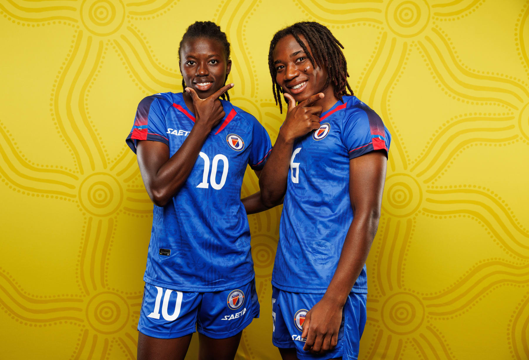 PERTH, AUSTRALIA - JULY 16: (L-R) Nerilia Mondesir of Haiti and Melchie Dumonay of Haiti pose for a portrait during the official FIFA Women's World Cup Australia & New Zealand 2023 portrait session on July 16, 2023 in Perth, Australia. (Photo by Paul Kane - FIFA/FIFA via Getty Images)