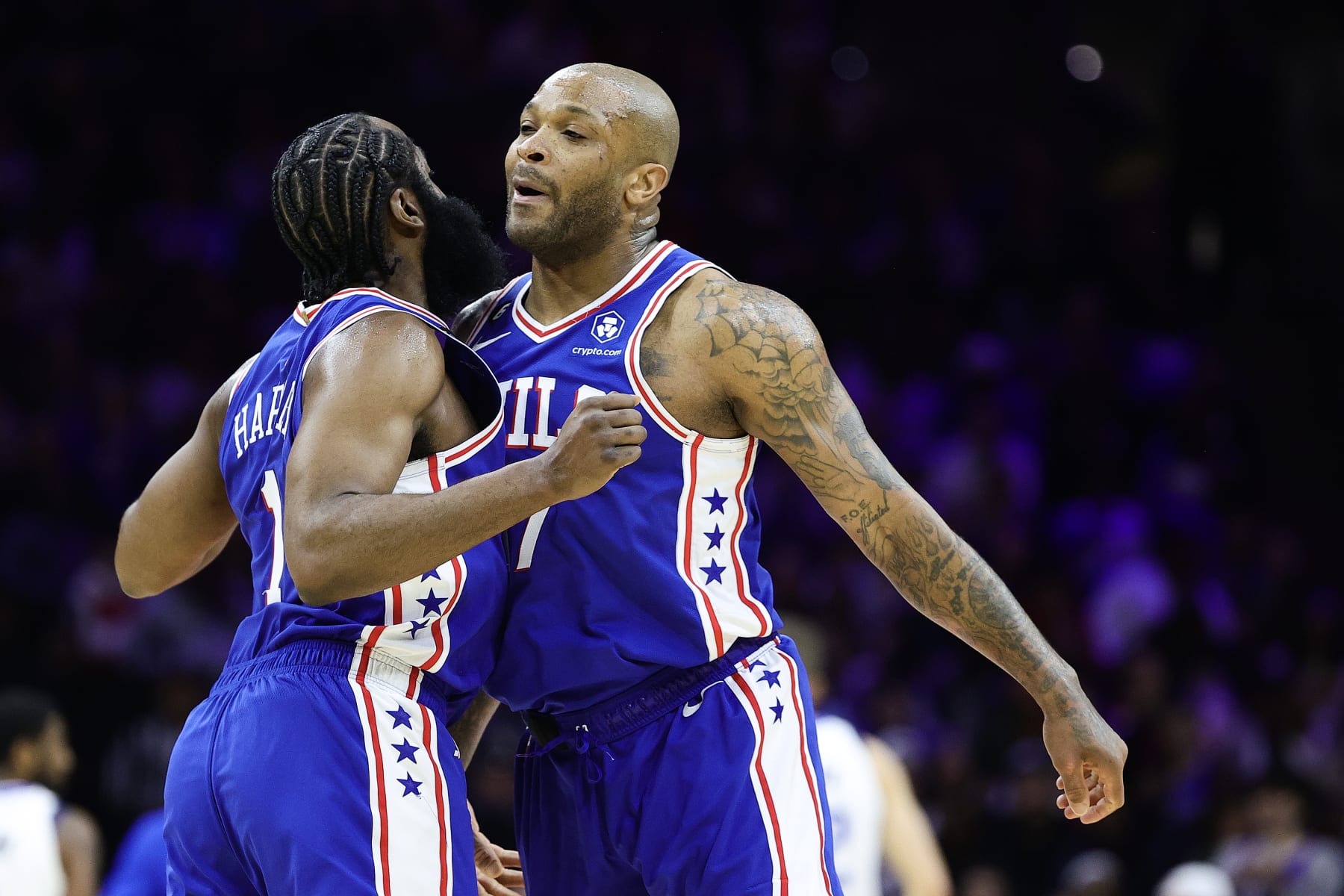 PHILADELPHIA, PENNSYLVANIA - MARCH 29: James Harden #1 and P.J. Tucker #17 of the Philadelphia 76ers react during the third quarter against the Dallas Mavericks at Wells Fargo Center on March 29, 2023 in Philadelphia, Pennsylvania. NOTE TO USER: User expressly acknowledges and agrees that, by downloading and or using this photograph, User is consenting to the terms and conditions of the Getty Images License Agreement. (Photo by Tim Nwachukwu/Getty Images)