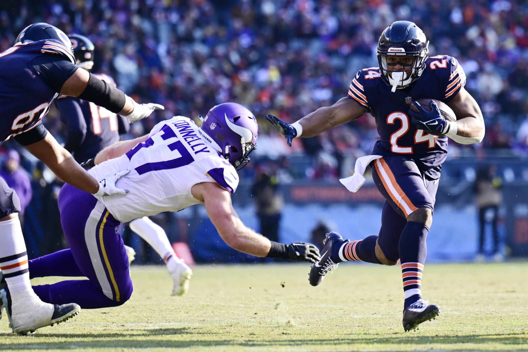 CHICAGO, ILLINOIS - JANUARY 08: Khalil Herbert #24 of the Chicago Bears runs with the ball during the second half of the game agains the Minnesota Vikings at Soldier Field on January 08, 2023 in Chicago, Illinois. (Photo by Quinn Harris/Getty Images)