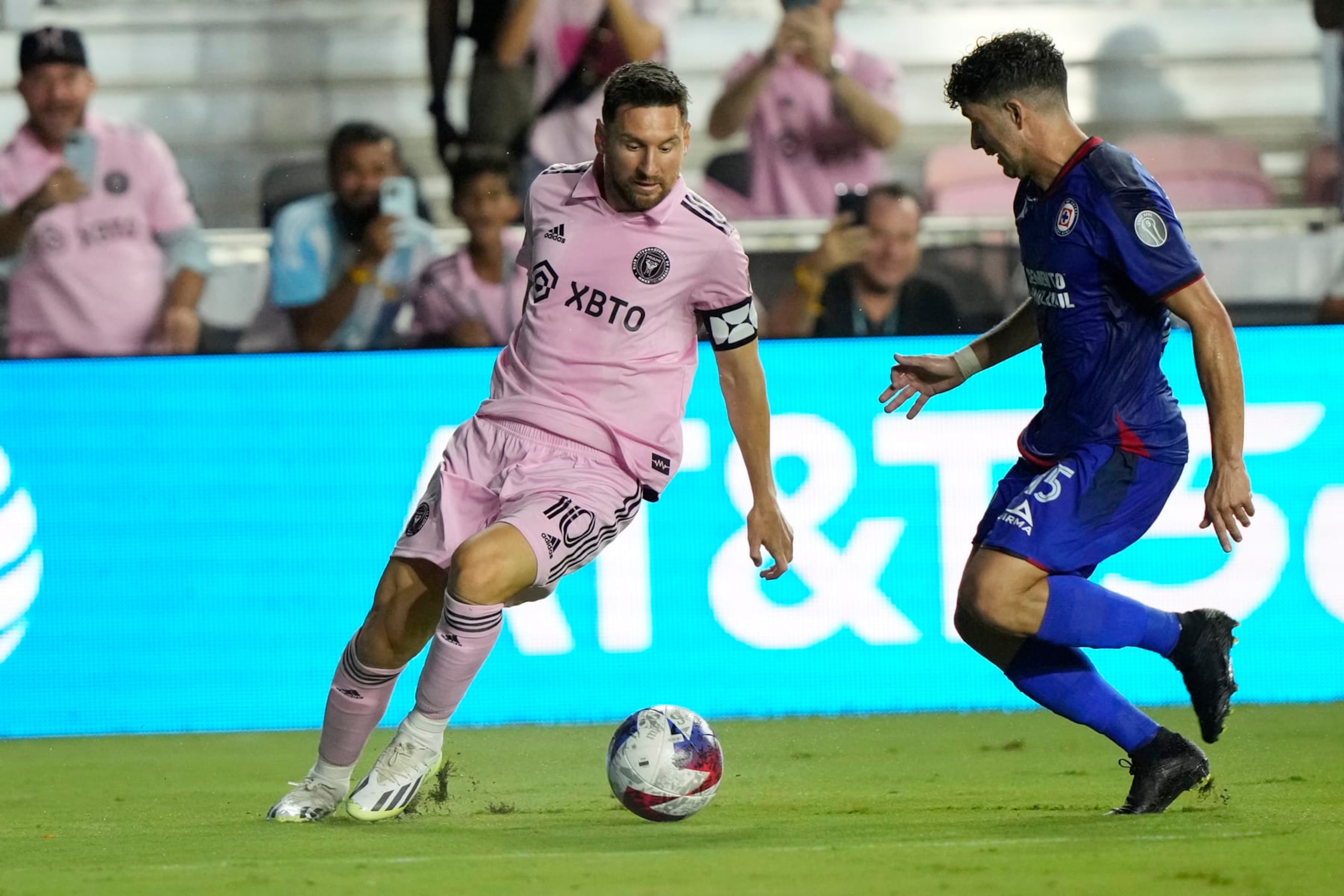 Cruz Azul midfielder Jose Rivero (15) defends Inter Miami forward Lionel Messi (10) during the second half of a Leagues Cup soccer match, Friday, July 21, 2023, in Fort Lauderdale, Fla. (AP Photo/Lynne Sladky) Cruz Azul midfielder Jose Rivero (15) defends Inter Miami forward Lionel Messi (10) during the second half of a Leagues Cup soccer match, Friday, July 21, 2023, in Fort Lauderdale, Fla. (AP Photo/Lynne Sladky)