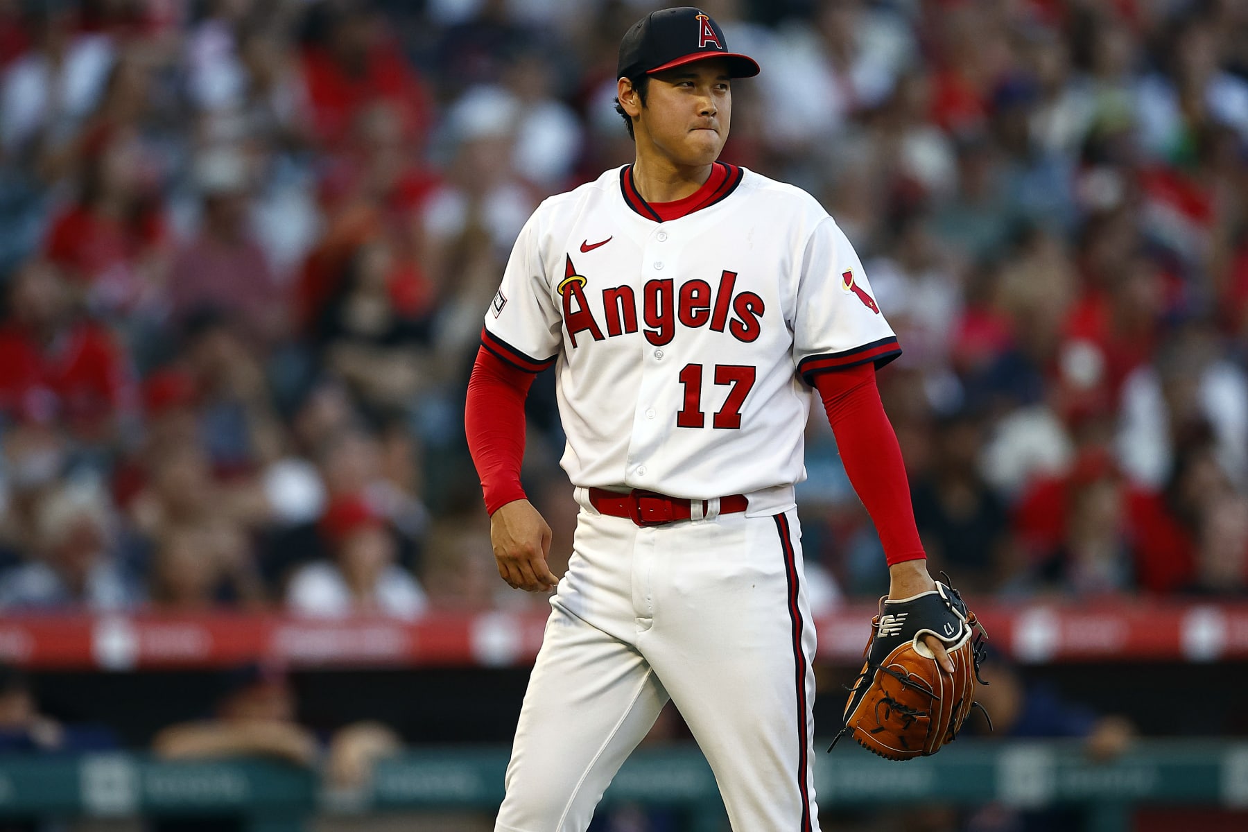 ANAHEIM, CALIFORNIA - JULY 21:  Shohei Ohtani #17 of the Los Angeles Angels after giving up a home run against Ji Man Choi #91 of the Pittsburgh Pirates in the fourth inning at Angel Stadium of Anaheim on July 21, 2023 in Anaheim, California. (Photo by Ronald Martinez/Getty Images)