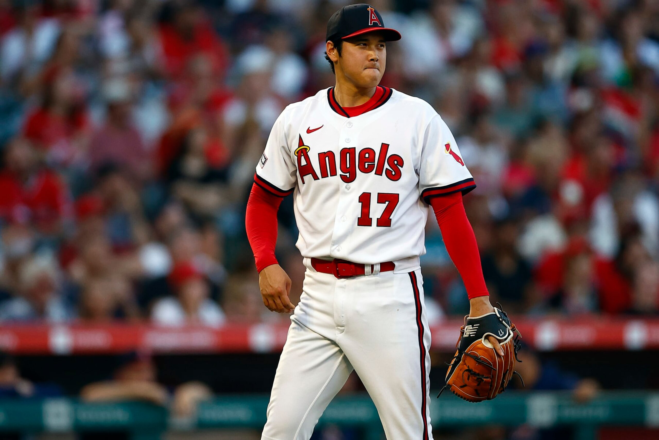 ANAHEIM, CALIFORNIA - JULY 21:  Shohei Ohtani #17 of the Los Angeles Angels after giving up a home run against Ji Man Choi #91 of the Pittsburgh Pirates in the fourth inning at Angel Stadium of Anaheim on July 21, 2023 in Anaheim, California. (Photo by Ronald Martinez/Getty Images)