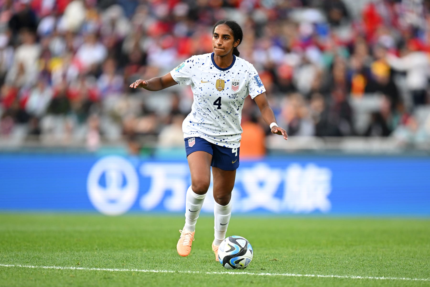 AUCKLAND, NEW ZEALAND - JULY 22: Naomi Girma of USA runs with the ball during the FIFA Women's World Cup Australia & New Zealand 2023 Group E match between USA and Vietnam at Eden Park on July 22, 2023 in Auckland / TÄmaki Makaurau, New Zealand. (Photo by Hannah Peters - FIFA/FIFA via Getty Images)
