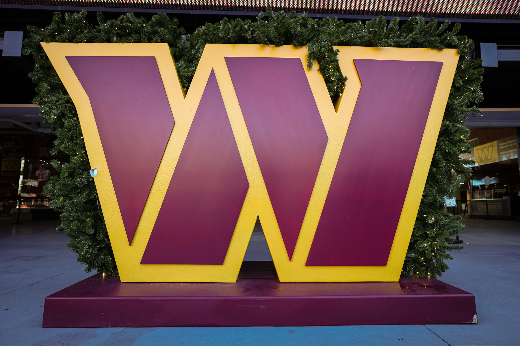 LANDOVER, MD - JANUARY 01: A general view of the Washington Commanders logo on the stadium concourse before the game between the Washington Commanders and the Cleveland Browns at FedExField on January 1, 2023 in Landover, Maryland. (Photo by Scott Taetsch/Getty Images)