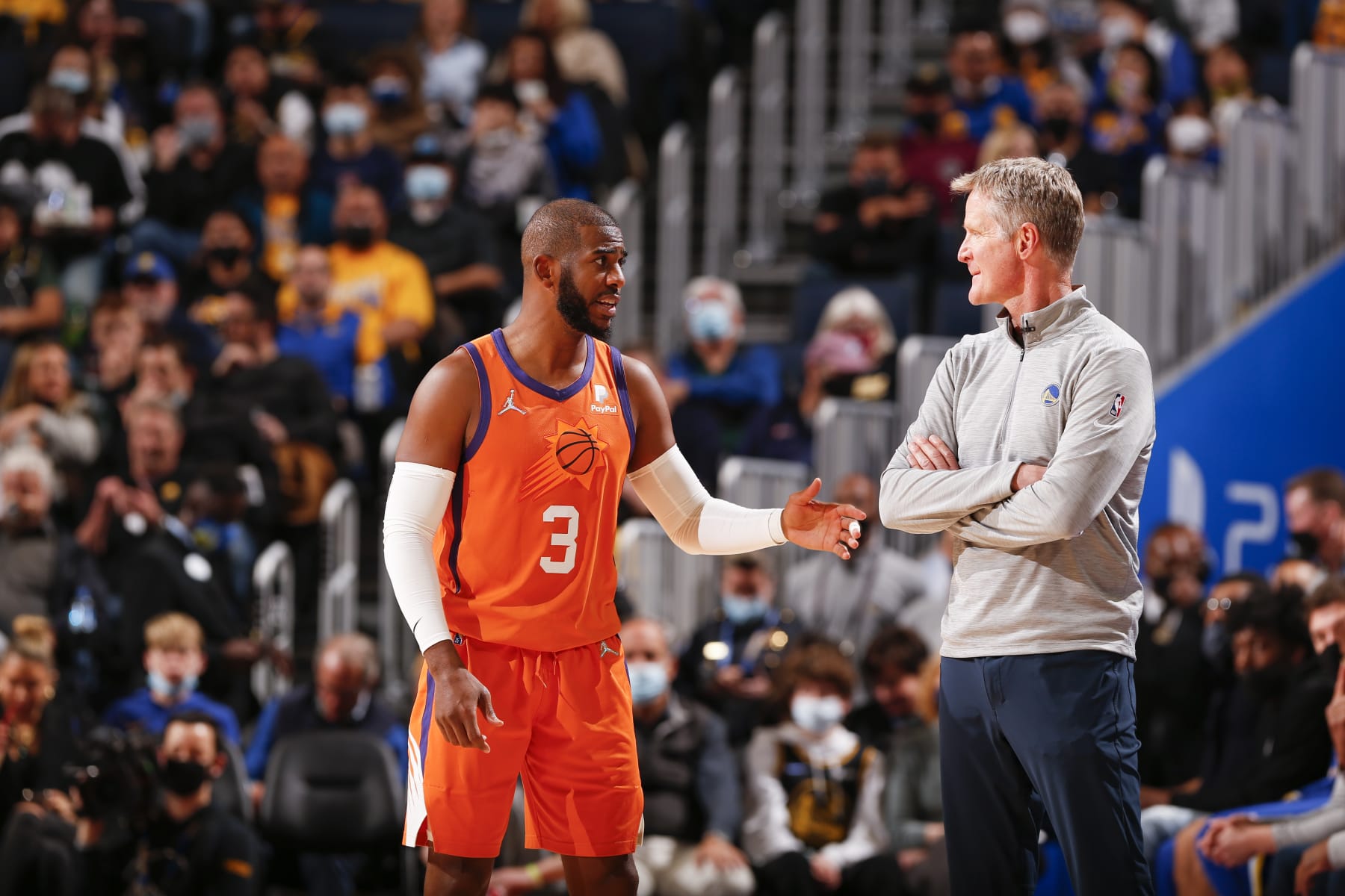 SAN FRANCISCO, CA - DECEMBER 3: Chris Paul #3 of the Phoenix Suns talks to Head Coach Steve Kerr of the Golden State Warriors during the game on December 3, 2021 at Chase Center in San Francisco, California. NOTE TO USER: User expressly acknowledges and agrees that, by downloading and or using this photograph, user is consenting to the terms and conditions of Getty Images License Agreement. Mandatory Copyright Notice: Copyright 2021 NBAE (Photo by Jed Jacobsohn/NBAE via Getty Images)