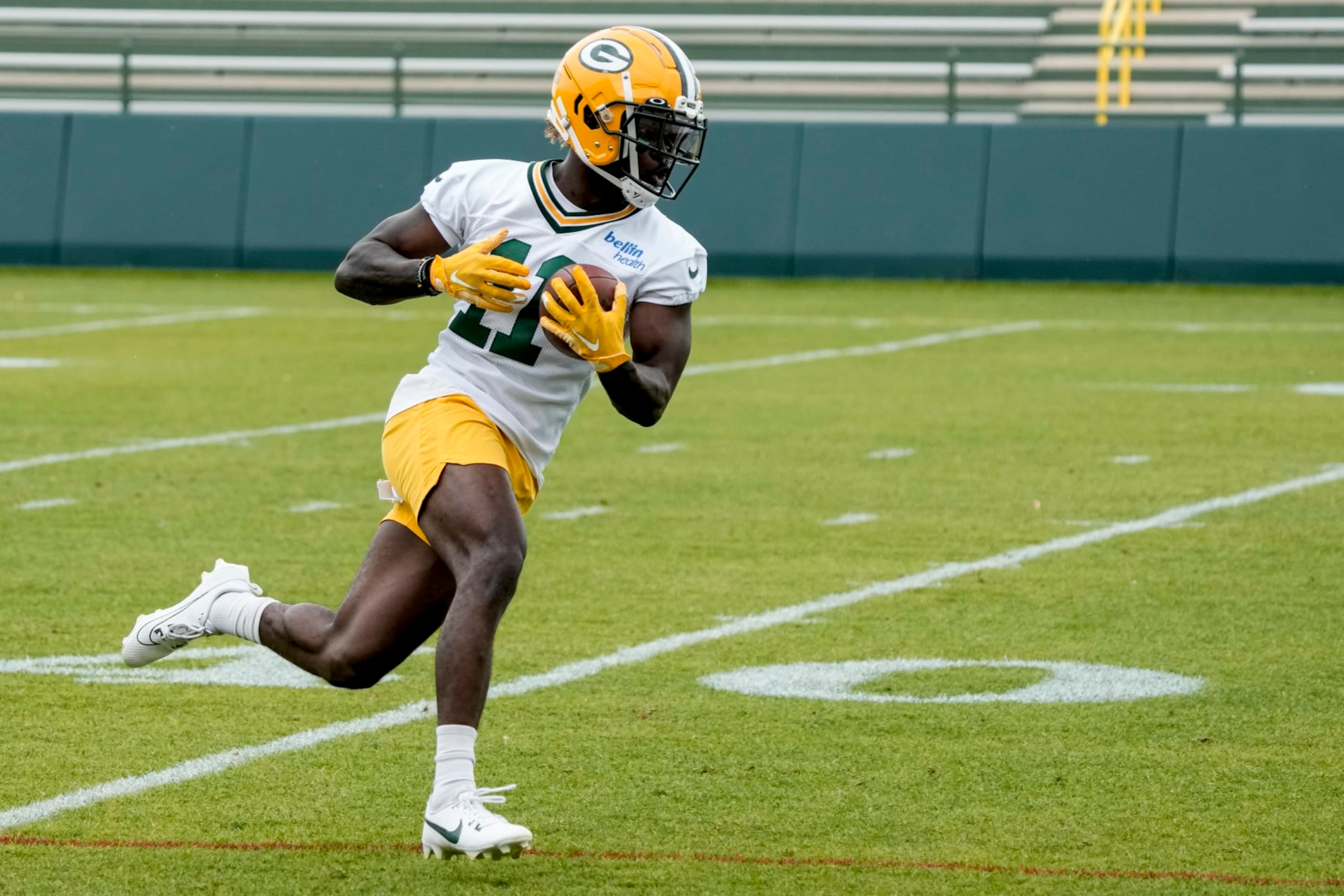 Green Bay Packers' Jayden Reed catches a pass during an NFL football OTA practice session Wednesday, May 31, 2023, in Green Bay, Wis. (AP Photo/Morry Gash)
