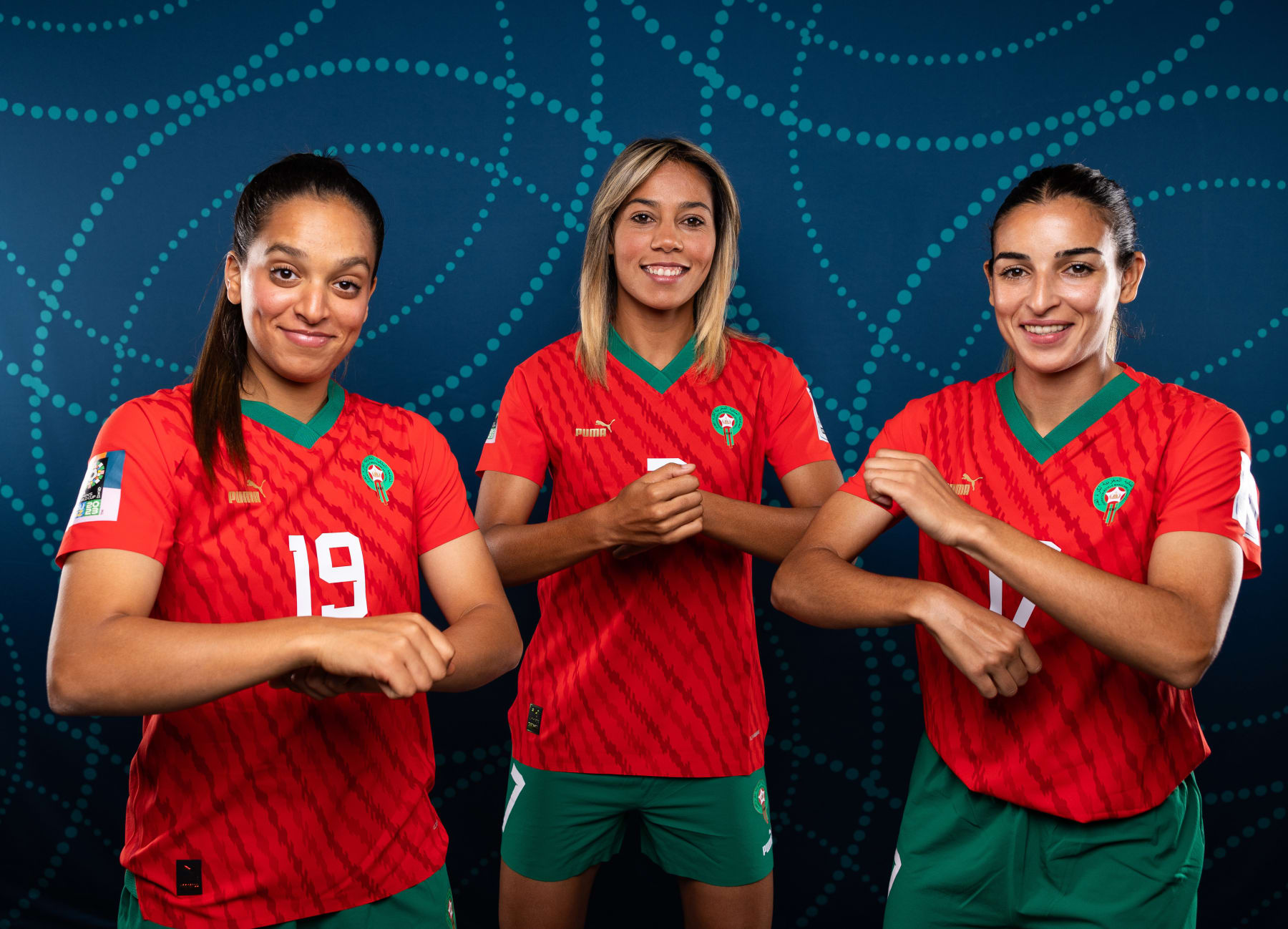 MELBOURNE, AUSTRALIA - JULY 17: Sakina Ouzraoui, Ghizlane Chebbak and Hanane Ait El Haj of Morocco pose during the official FIFA Women's World Cup Australia & New Zealand 2023 portrait session at  on July 17, 2023 in Melbourne, Australia. (Photo by Alex Pantling - FIFA/FIFA via Getty Images)