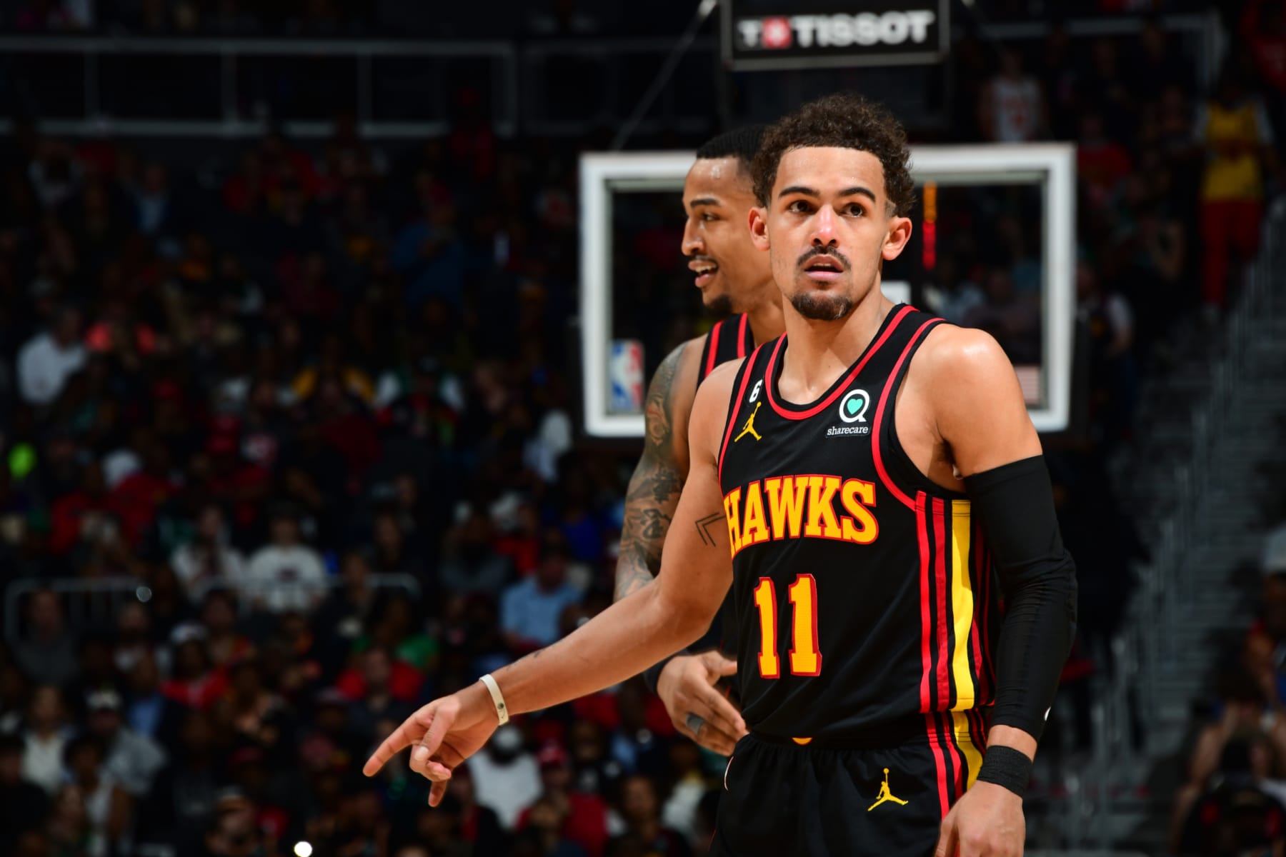 ATLANTA, GA - APRIL 27: Trae Young #11 of the Atlanta Hawks looks on during Round One Game Six of the 2023 NBA Playoffs on April 27, 2023 at State Farm Arena in Atlanta, Georgia.  NOTE TO USER: User expressly acknowledges and agrees that, by downloading and/or using this Photograph, user is consenting to the terms and conditions of the Getty Images License Agreement. Mandatory Copyright Notice: Copyright 2023 NBAE (Photo by Scott Cunningham/NBAE via Getty Images)