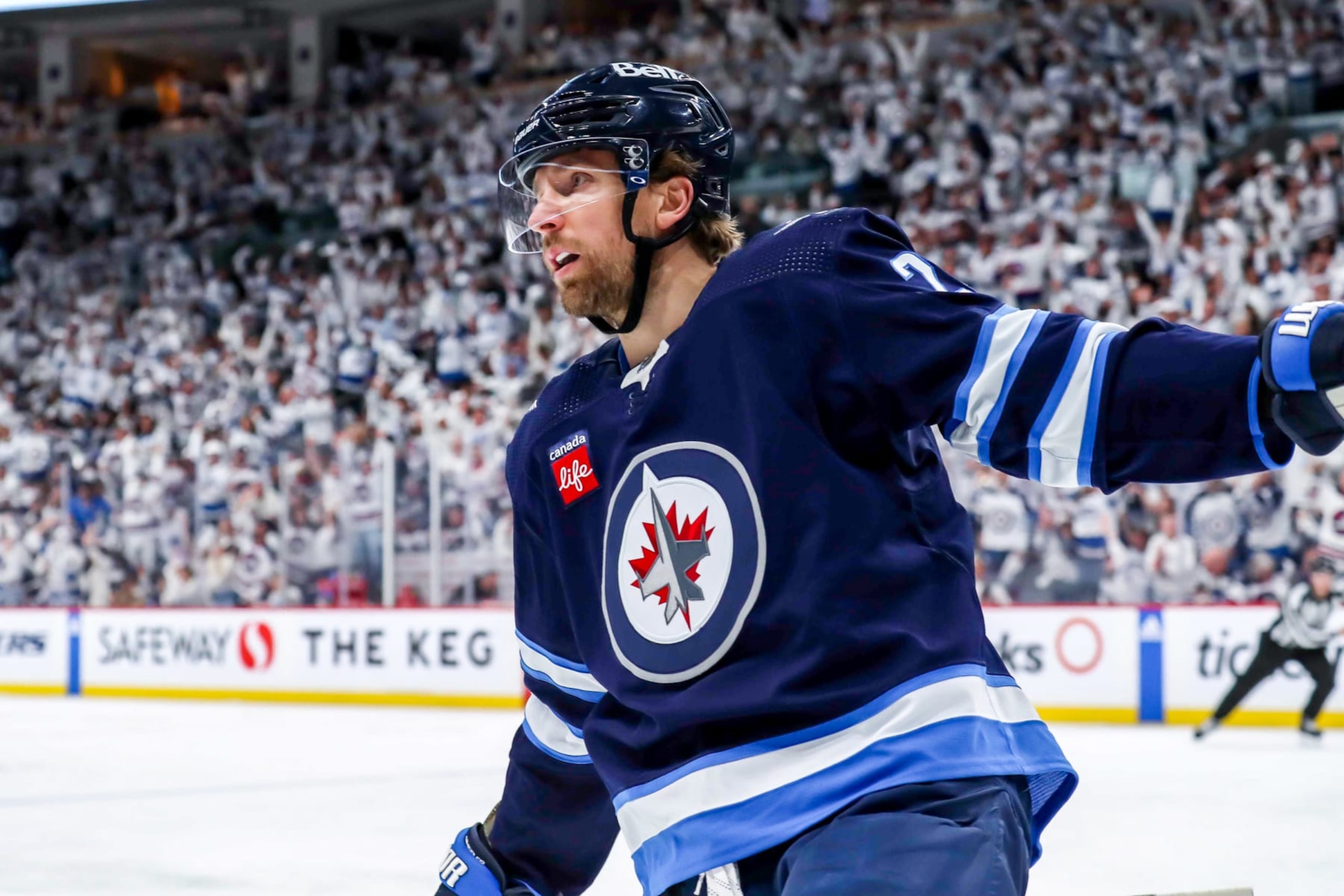 WINNIPEG, CANADA - APRIL 24: Blake Wheeler #26 of the Winnipeg Jets celebrates after scoring a first period goal against the Vegas Golden Knights in Game Four of the First Round of the 2023 Stanley Cup Playoffs at the Canada Life Centre on April 24, 2023 in Winnipeg, Manitoba, Canada. (Photo by Darcy Finley/NHLI via Getty Images)
