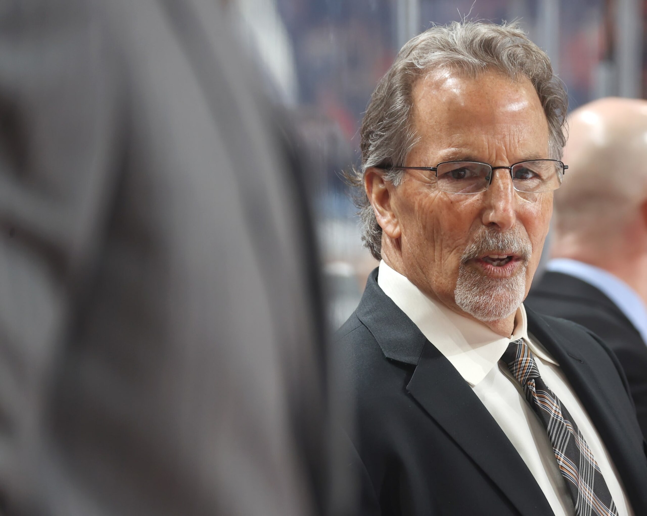 PHILADELPHIA, PENNSYLVANIA - MARCH 25:  Head Coach of the Philadelphia Flyers John Tortorella watches the play on the ice during the first period against the Detroit Red Wings at the Wells Fargo Center on March 25, 2023 in Philadelphia, Pennsylvania.  (Photo by Len Redkoles/NHLI via Getty Images)