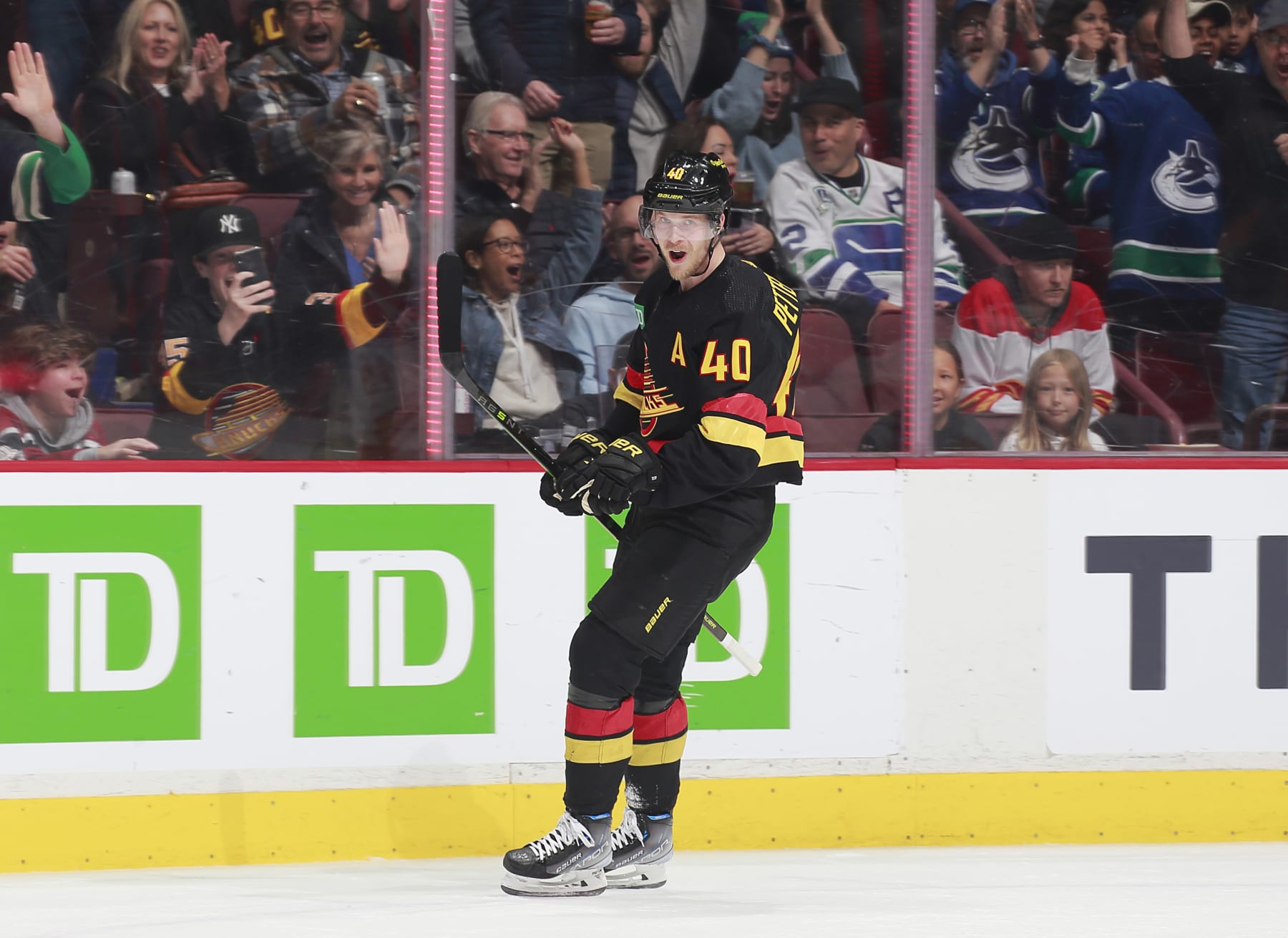 VANCOUVER, CANADA - APRIL 8: Elias Pettersson #40 of the Vancouver Canucks celebrates his goal during the first period of their NHL game against the Calgary Flames at Rogers Arena April 8, 2023 in Vancouver, British Columbia, Canada.  (Photo by Jeff Vinnick/NHLI via Getty Images)