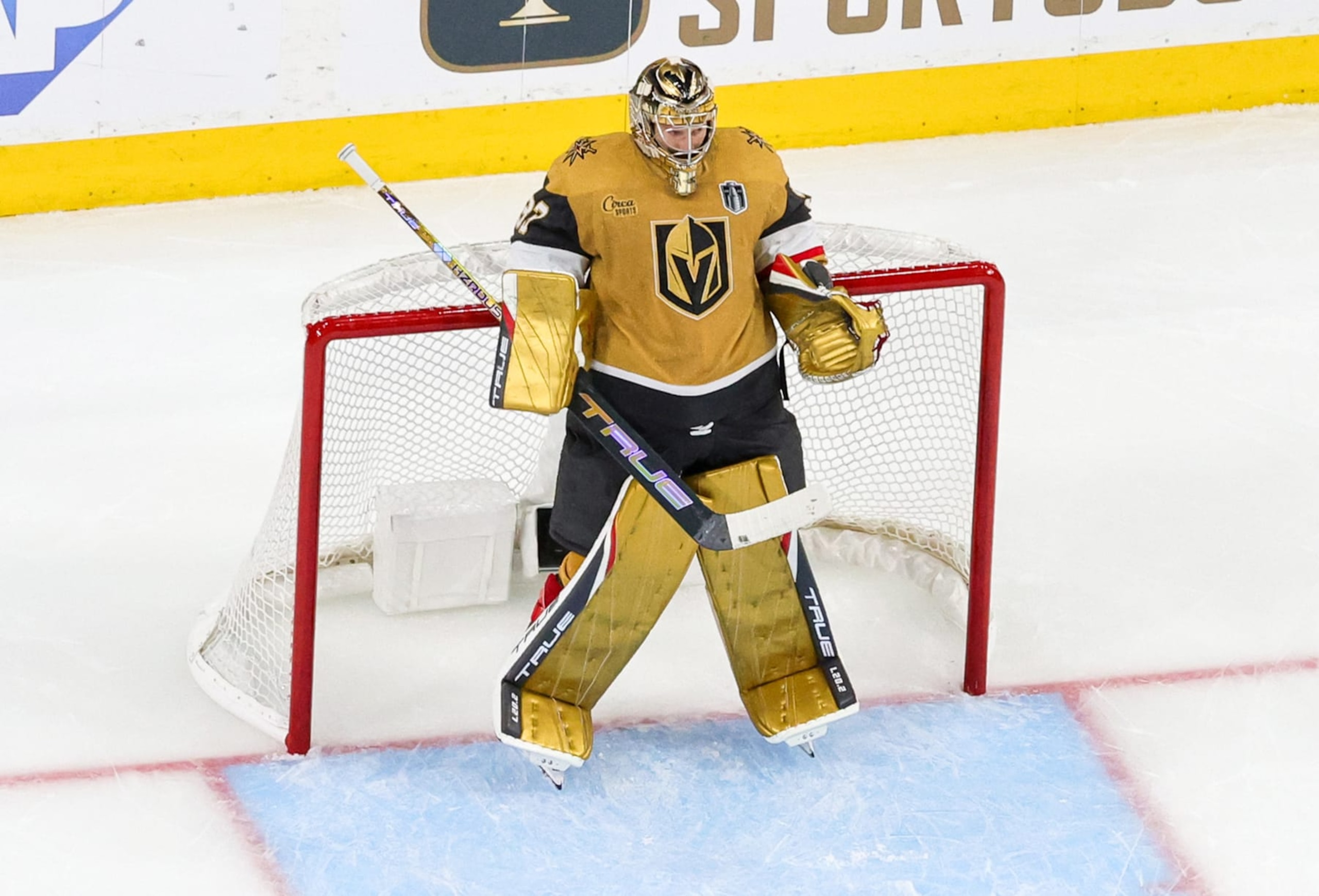 LAS VEGAS, NEVADA - JUNE 13: Adin Hill #33 of the Vegas Golden Knights leans back on a goal post as he takes a break during a stop in play in the second period of Game Five of the 2023 NHL Stanley Cup Final against the Florida Panthers at T-Mobile Arena on June 13, 2023 in Las Vegas, Nevada. The Golden Knights defeated the Panthers 9-3 to win the series four games to one. (Photo by Ethan Miller/Getty Images)