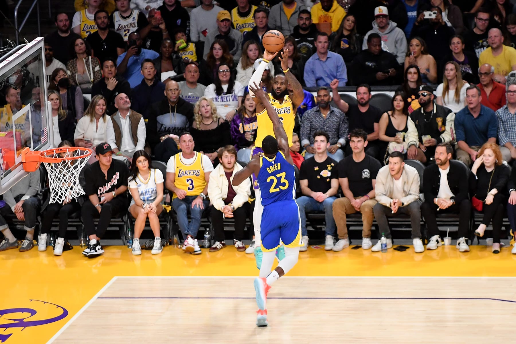 LOS ANGELES, CALIFORNIA - MAY 08: LeBron James #6 of the Los Angeles Lakers shoots the ball against Draymond Green #23 of the Golden State Warriors during Game Four of the Western Conference Semi-Finals of the 2023 NBA Playoffs at Crypto.com Arena on May 08, 2023 in Los Angeles, California. NOTE TO USER: User expressly acknowledges and agrees that,  by downloading and or using this photograph,  User is consenting to the terms and conditions of the Getty Images License Agreement. (Photo by Allen Berezovsky/Getty Images)