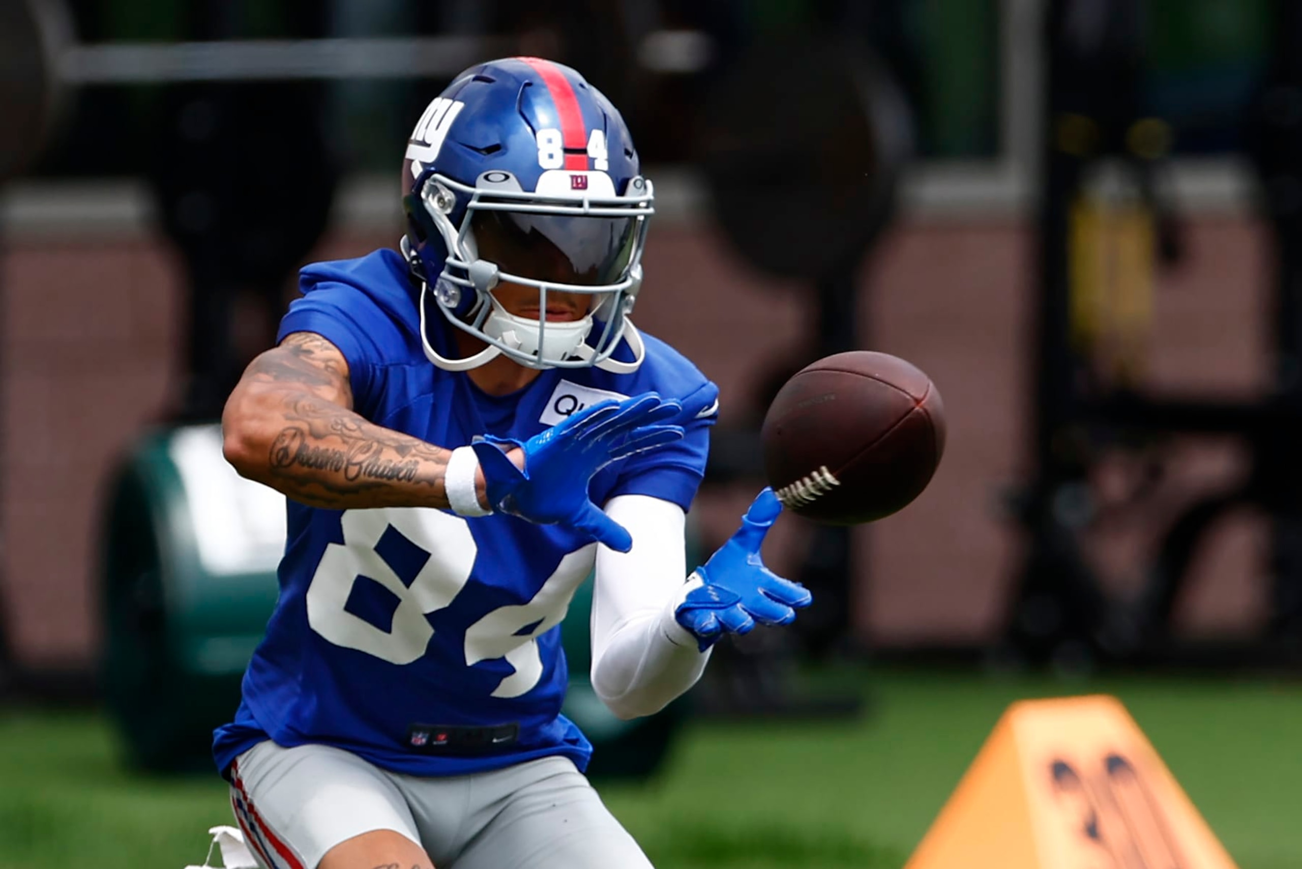 EAST RUTHERFORD, NEW JERSEY - JUNE 14: Wide receiver Jalin Hyatt #84 makes a catch during the team's mini camp at Quest Training Center on June 14, 2023 in East Rutherford, New Jersey. (Photo by Rich Schultz/Getty Images) EAST RUTHERFORD, NEW JERSEY - JUNE 14: Wide receiver Jalin Hyatt #84 makes a catch during the team's mini camp at Quest Training Center on June 14, 2023 in East Rutherford, New Jersey. (Photo by Rich Schultz/Getty Images)