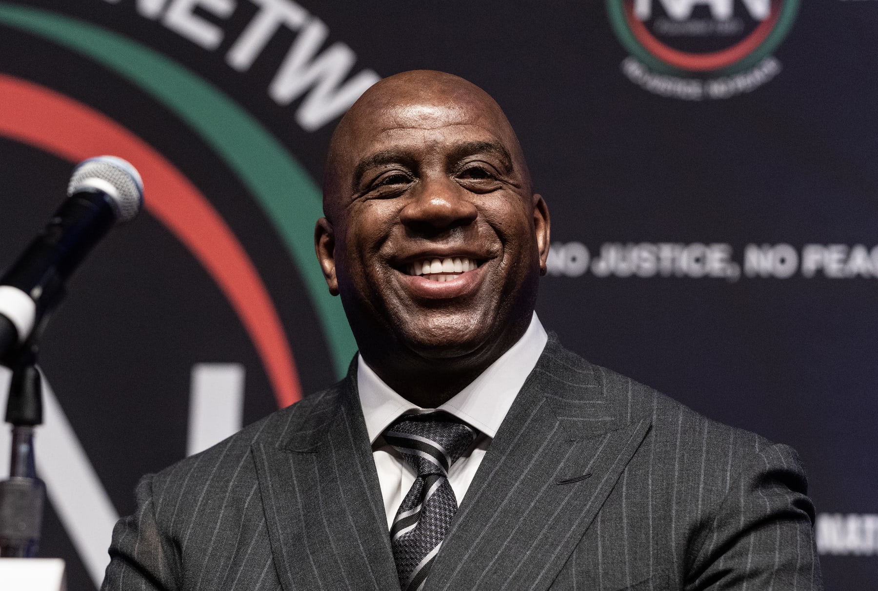 NEW YORK, UNITED STATES - 2023/04/13: Earvin Magic Johnson participates in chat with mayor Eric Adams and Al Sharpton at NAN 2023 convention day 2 at Sheraton Times Square. National Action Network (NAN) holds an annual conference inviting elected official, civil rights leaders and public to speak and participate in conversations about civil and human rights in the USA. (Photo by Lev Radin/Pacific Press/LightRocket via Getty Images)