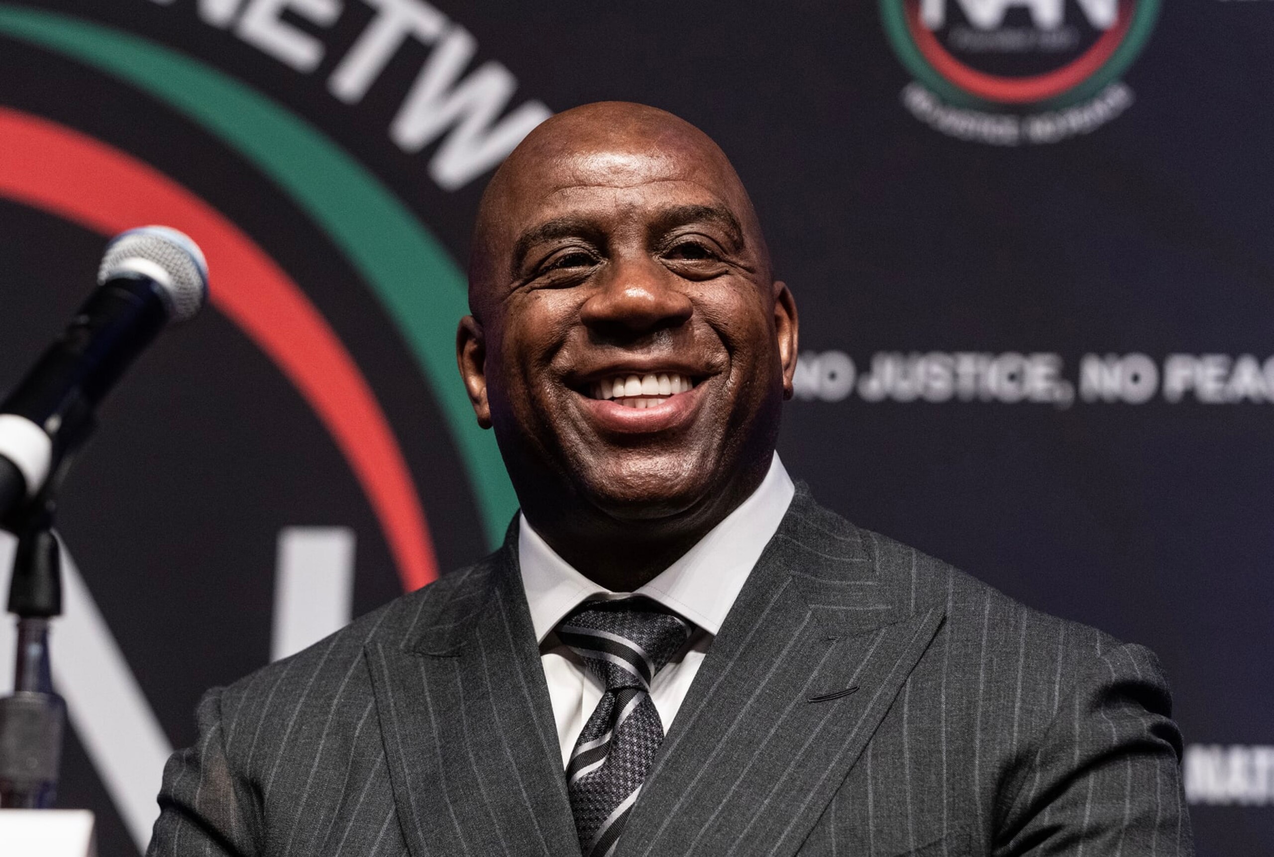 NEW YORK, UNITED STATES - 2023/04/13: Earvin Magic Johnson participates in chat with mayor Eric Adams and Al Sharpton at NAN 2023 convention day 2 at Sheraton Times Square. National Action Network (NAN) holds an annual conference inviting elected official, civil rights leaders and public to speak and participate in conversations about civil and human rights in the USA. (Photo by Lev Radin/Pacific Press/LightRocket via Getty Images)
