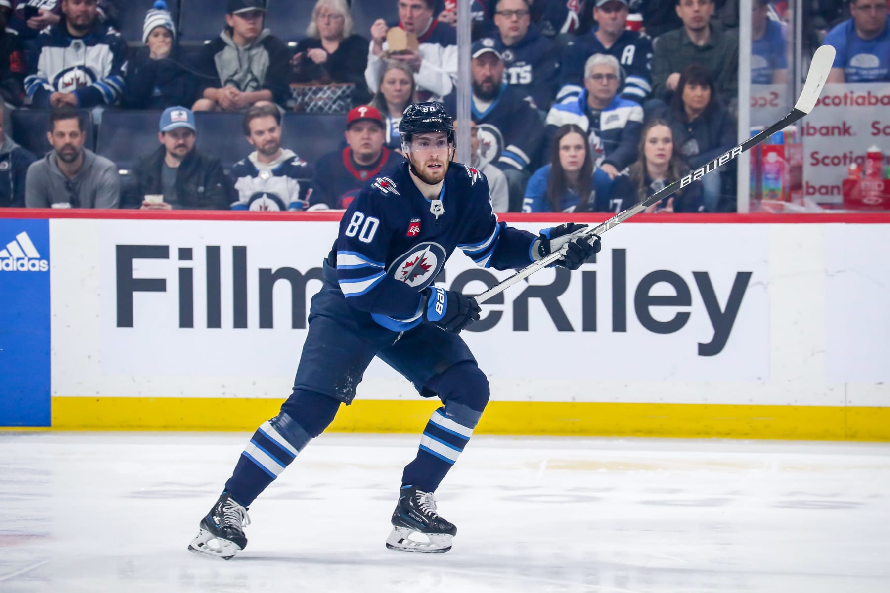 WINNIPEG, CANADA - APRIL 10: Pierre-Luc Dubois #80 of the Winnipeg Jets keeps an eye on the play during first period action against the San Jose Sharks at the Canada Life Centre on April 10, 2023 in Winnipeg, Manitoba, Canada. The Jets defeated the Sharks 6-2. (Photo by Darcy Finley/NHLI via Getty Images)