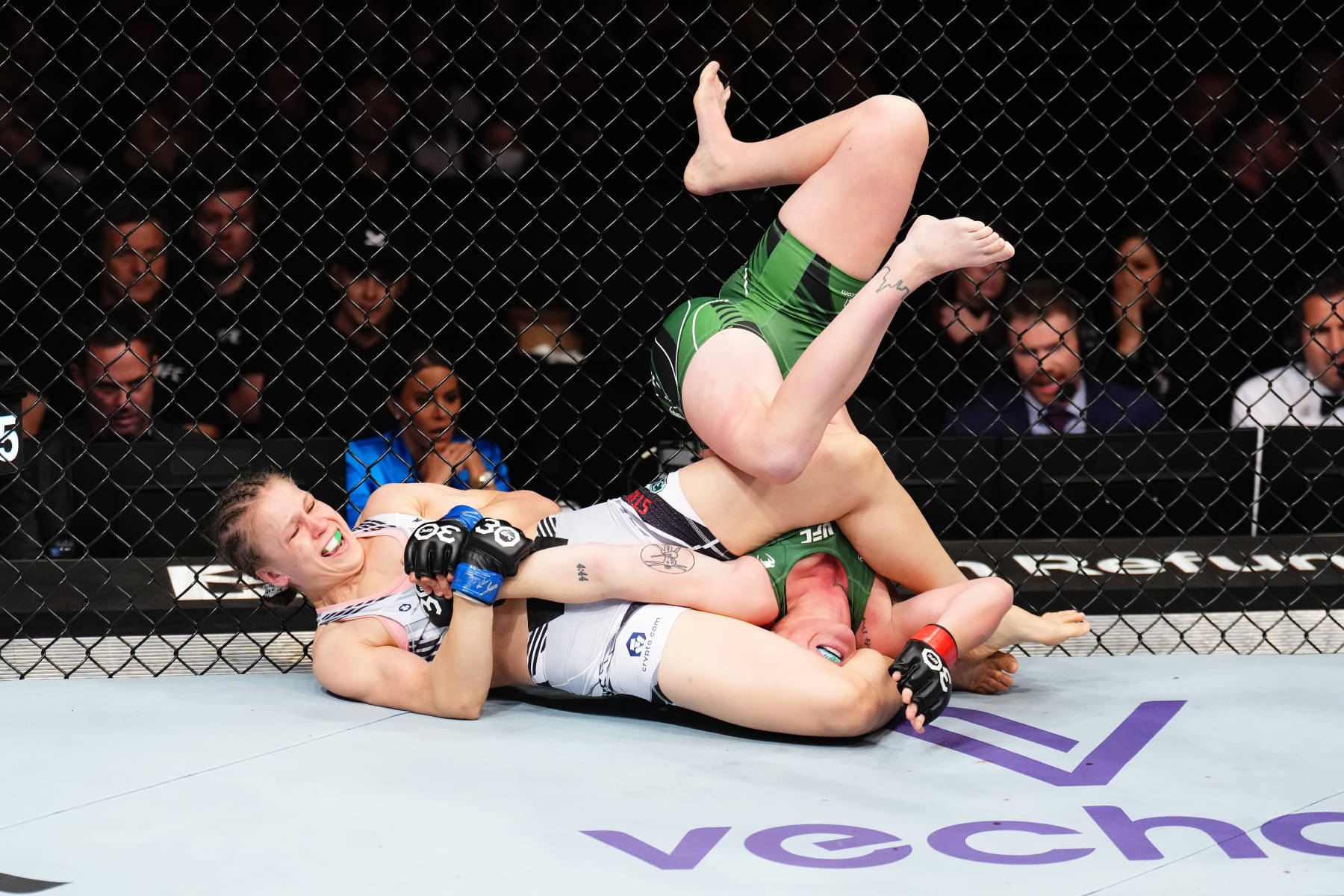 LONDON, ENGLAND - JULY 22: (L-R) Julija Stoliarenko of Lithuania submits Molly McCann of England by armbar in their women's flyweight fight during the UFC Fight Night at The O2 Arena on July 22, 2023 in London, England. (Photo by Chris Unger/Zuffa LLC via Getty Images)