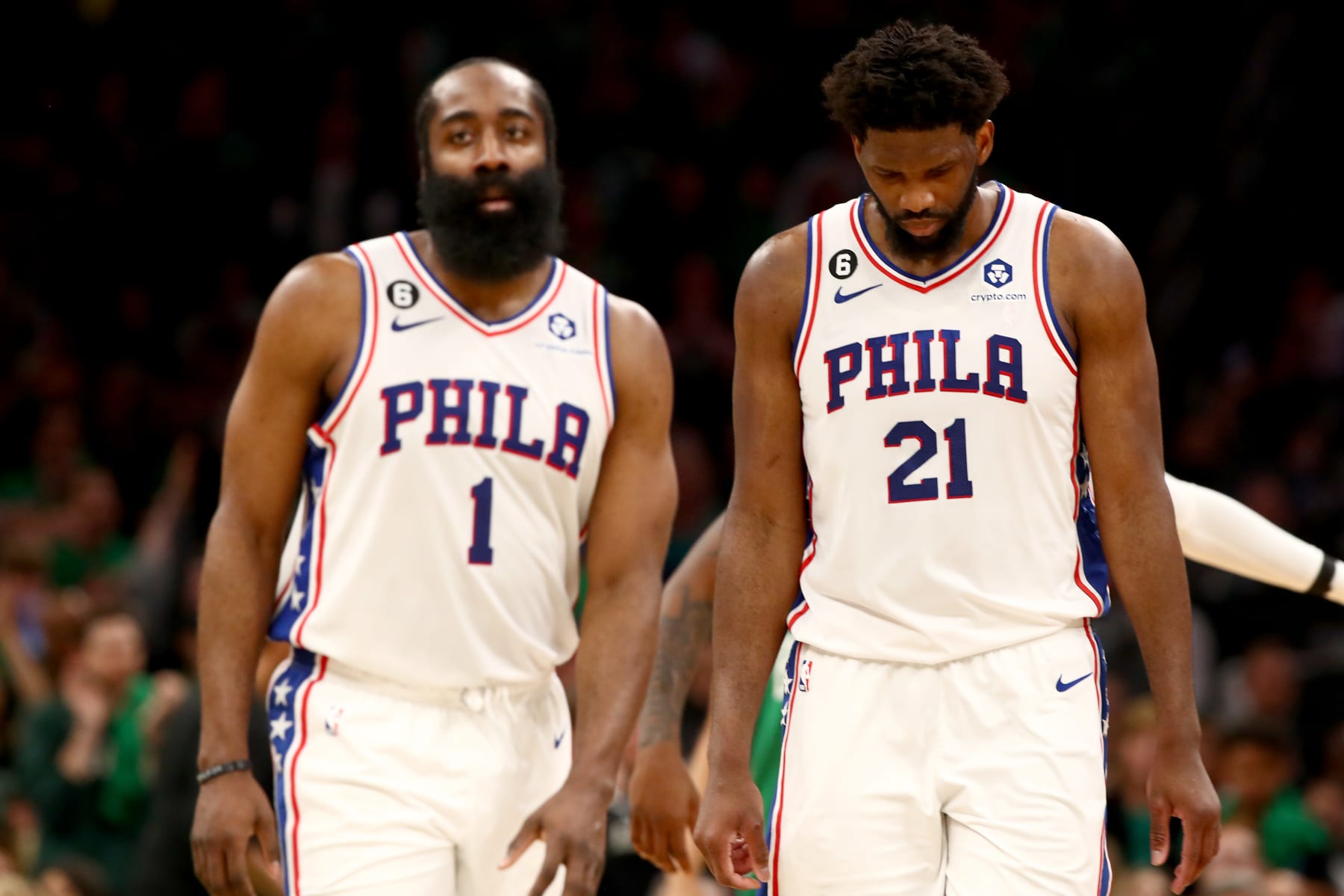 BOSTON, MASSACHUSETTS - MAY 14: James Harden #1 and Joel Embiid #21 of the Philadelphia 76ers reacts against the Boston Celtics during the third quarter in game seven of the 2023 NBA Playoffs Eastern Conference Semifinals at TD Garden on May 14, 2023 in Boston, Massachusetts. NOTE TO USER: User expressly acknowledges and agrees that, by downloading and or using this photograph, User is consenting to the terms and conditions of the Getty Images License Agreement. (Photo by Adam Glanzman/Getty Images)