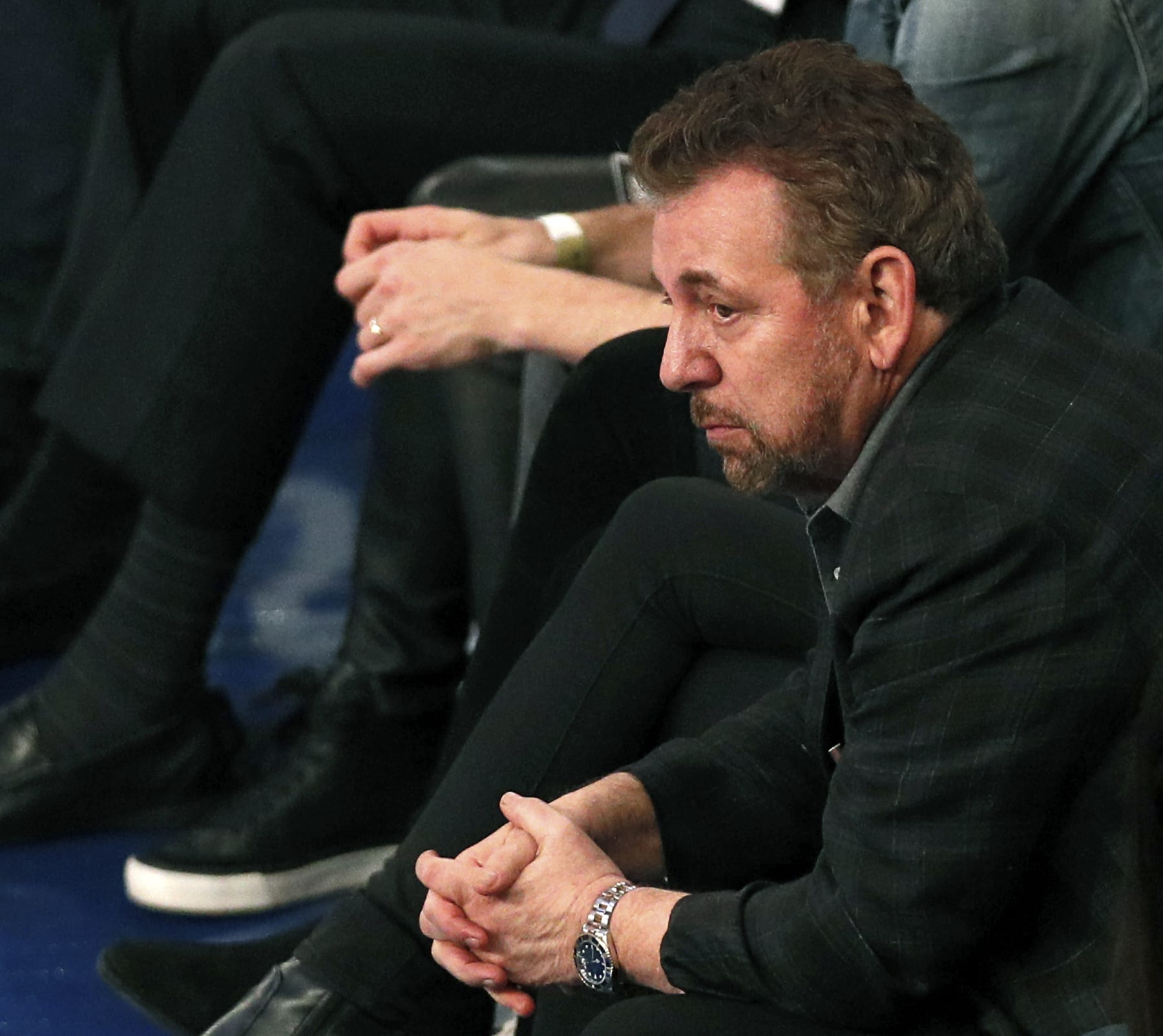 NEW YORK, NY - MARCH 28:  New York Knicks owner James Dolan reacts as he watches an NBA basketball game against the Toronto Raptors from his front row seat on March 28, 2019 at Madison Square Garden Center in New York City. Raptors won 117-92. NOTE TO USER: User expressly acknowledges and agrees that, by downloading and/or using this Photograph, user is consenting to the terms and conditions of the Getty License agreement. Mandatory Copyright Notice (Photo by Paul Bereswill/Getty Images)