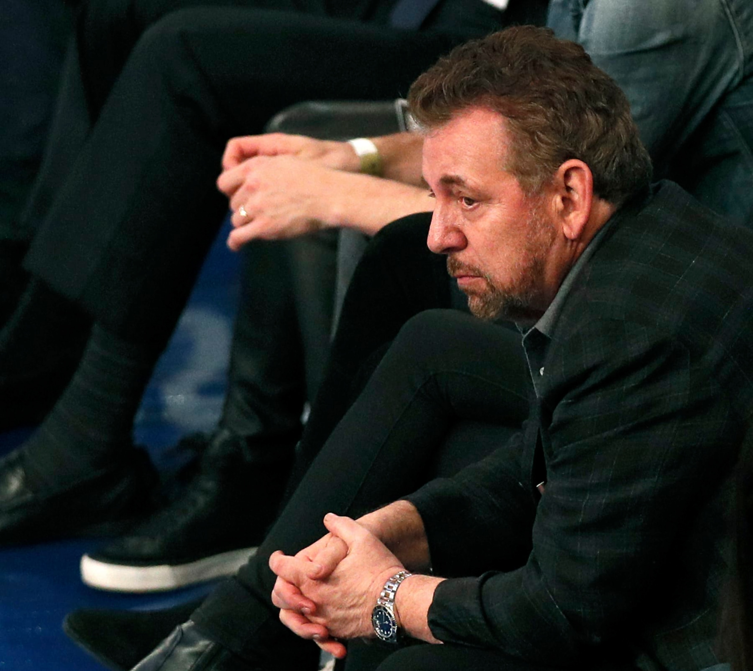 NEW YORK, NY - MARCH 28:  New York Knicks owner James Dolan reacts as he watches an NBA basketball game against the Toronto Raptors from his front row seat on March 28, 2019 at Madison Square Garden Center in New York City. Raptors won 117-92. NOTE TO USER: User expressly acknowledges and agrees that, by downloading and/or using this Photograph, user is consenting to the terms and conditions of the Getty License agreement. Mandatory Copyright Notice (Photo by Paul Bereswill/Getty Images)