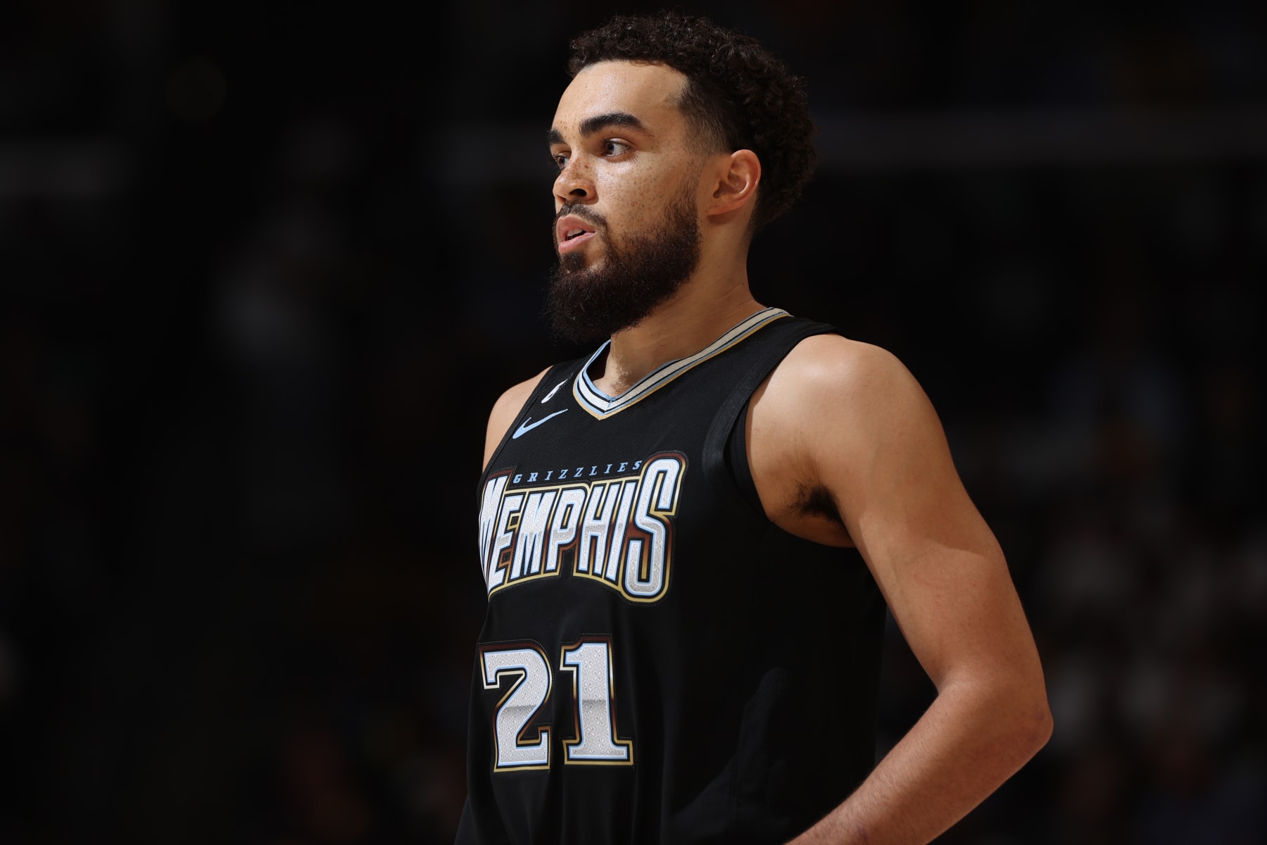 MEMPHIS, TN - APRIL 19: Tyus Jones #21 of the Memphis Grizzlies looks on during the game against the Los Angeles Lakers during Round One Game Two of the 2023 NBA Playoffs on April 19, 2023 at FedExForum in Memphis, Tennessee. NOTE TO USER: User expressly acknowledges and agrees that, by downloading and or using this photograph, User is consenting to the terms and conditions of the Getty Images License Agreement. Mandatory Copyright Notice: Copyright 2023 NBAE (Photo by Joe Murphy/NBAE via Getty Images)