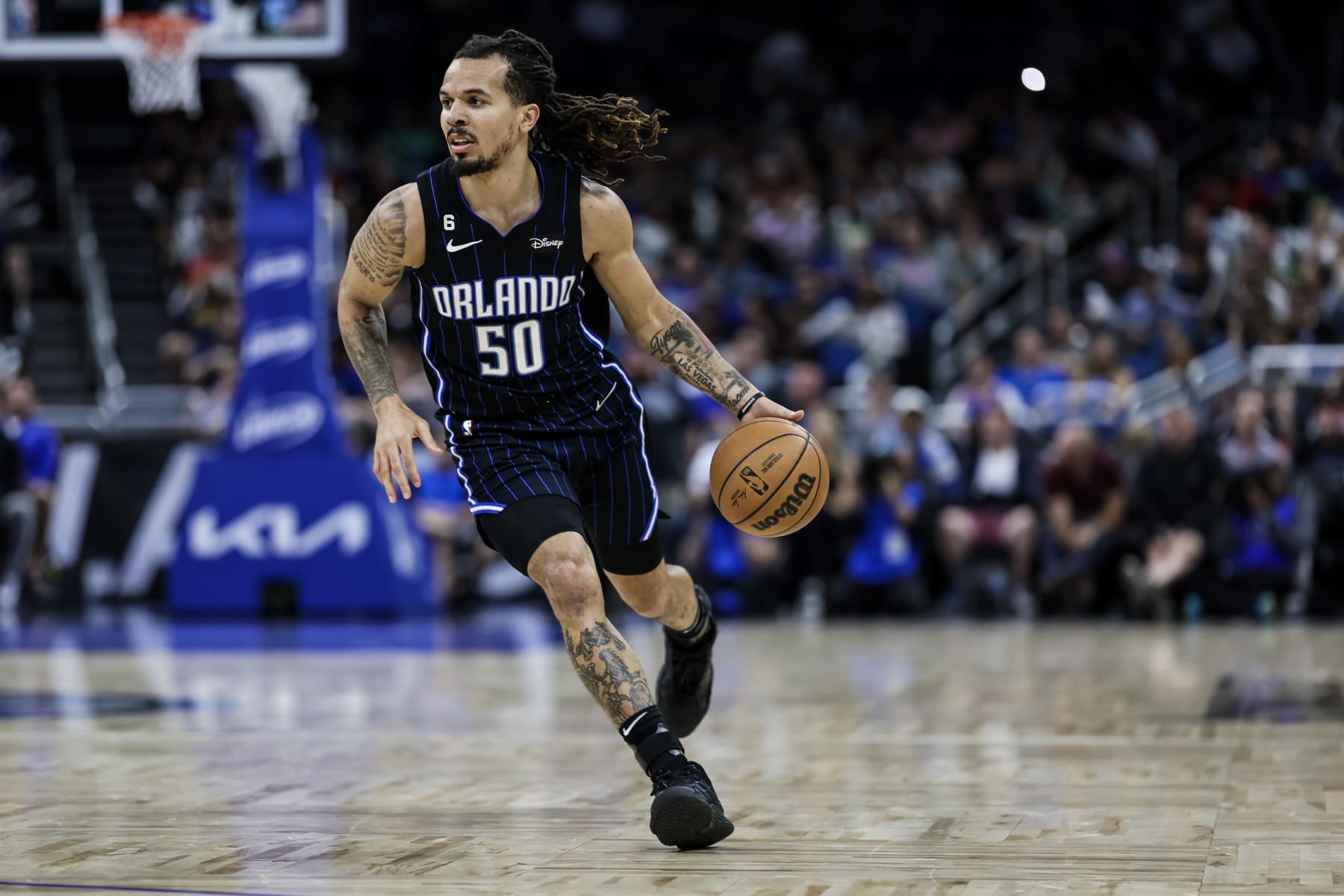 ORLANDO, FLORIDA - APRIL 02: Cole Anthony #50 of the Orlando Magic dribbles the ball during the second half of a game against the Detroit Pistons at the Amway Center on April 02, 2023 in Orlando, Florida. NOTE TO USER: User expressly acknowledges and agrees that, by downloading and or using this photograph, User is consenting to the terms and conditions of the Getty Images License Agreement. (Photo by James Gilbert/Getty Images)