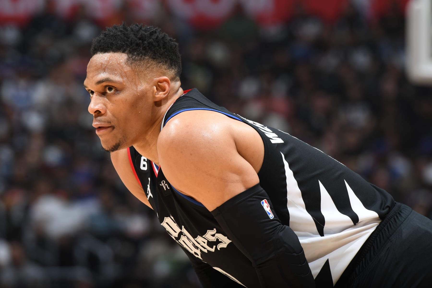 LOS ANGELES, CA - APRIL 22: Russell Westbrook #0 of the LA Clippers looks on during Round One Game Four of the 2023 NBA Playoffs against the Phoenix Suns on April 22, 2023 at Crypto.Com Arena in Los Angeles, California. NOTE TO USER: User expressly acknowledges and agrees that, by downloading and/or using this Photograph, user is consenting to the terms and conditions of the Getty Images License Agreement. Mandatory Copyright Notice: Copyright 2023 NBAE (Photo by Andrew D. Bernstein/NBAE via Getty Images)
