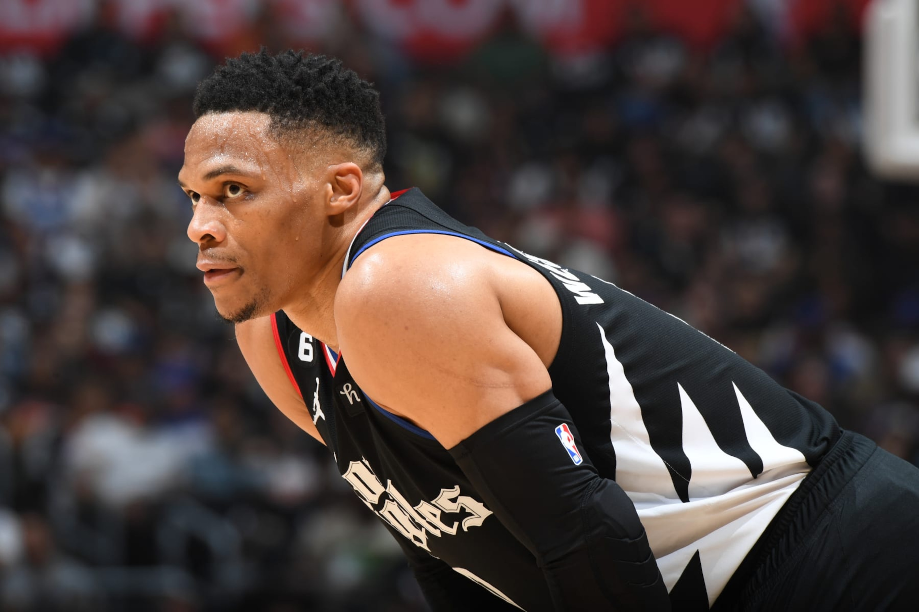 LOS ANGELES, CA - APRIL 22: Russell Westbrook #0 of the LA Clippers looks on during Round One Game Four of the 2023 NBA Playoffs against the Phoenix Suns on April 22, 2023 at Crypto.Com Arena in Los Angeles, California. NOTE TO USER: User expressly acknowledges and agrees that, by downloading and/or using this Photograph, user is consenting to the terms and conditions of the Getty Images License Agreement. Mandatory Copyright Notice: Copyright 2023 NBAE (Photo by Andrew D. Bernstein/NBAE via Getty Images)