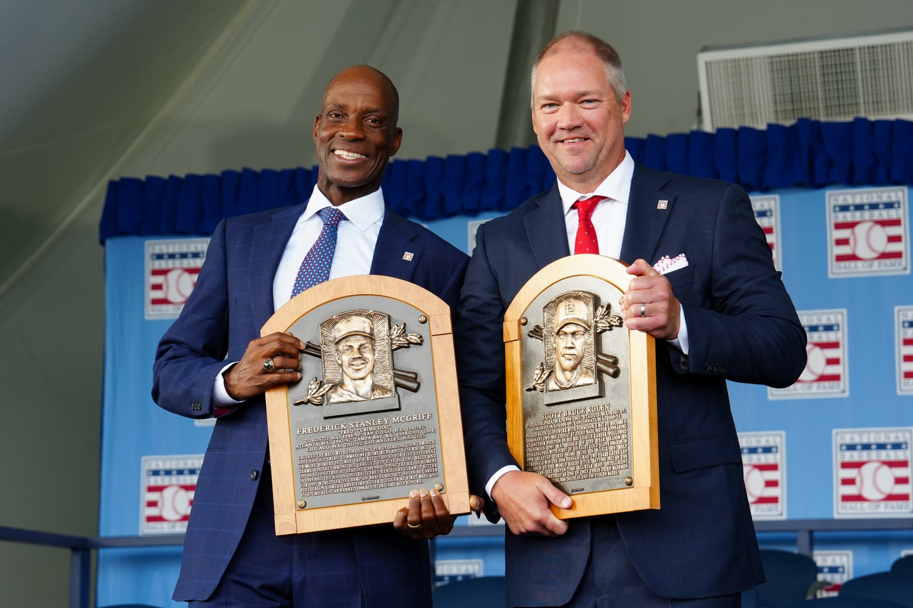COOPERSTOWN, NY - JULY 23:   Baseball Hall of Fame 2023 inductees Fred McGriff and Scott Rolen pose for a photo with their HOF plaques during the 2023 Hall of Fame Induction Ceremony at Clark Sports Center on Sunday, July 23, 2023 in Cooperstown, New York. (Photo by Mary DeCicco/MLB Photos via Getty Images)