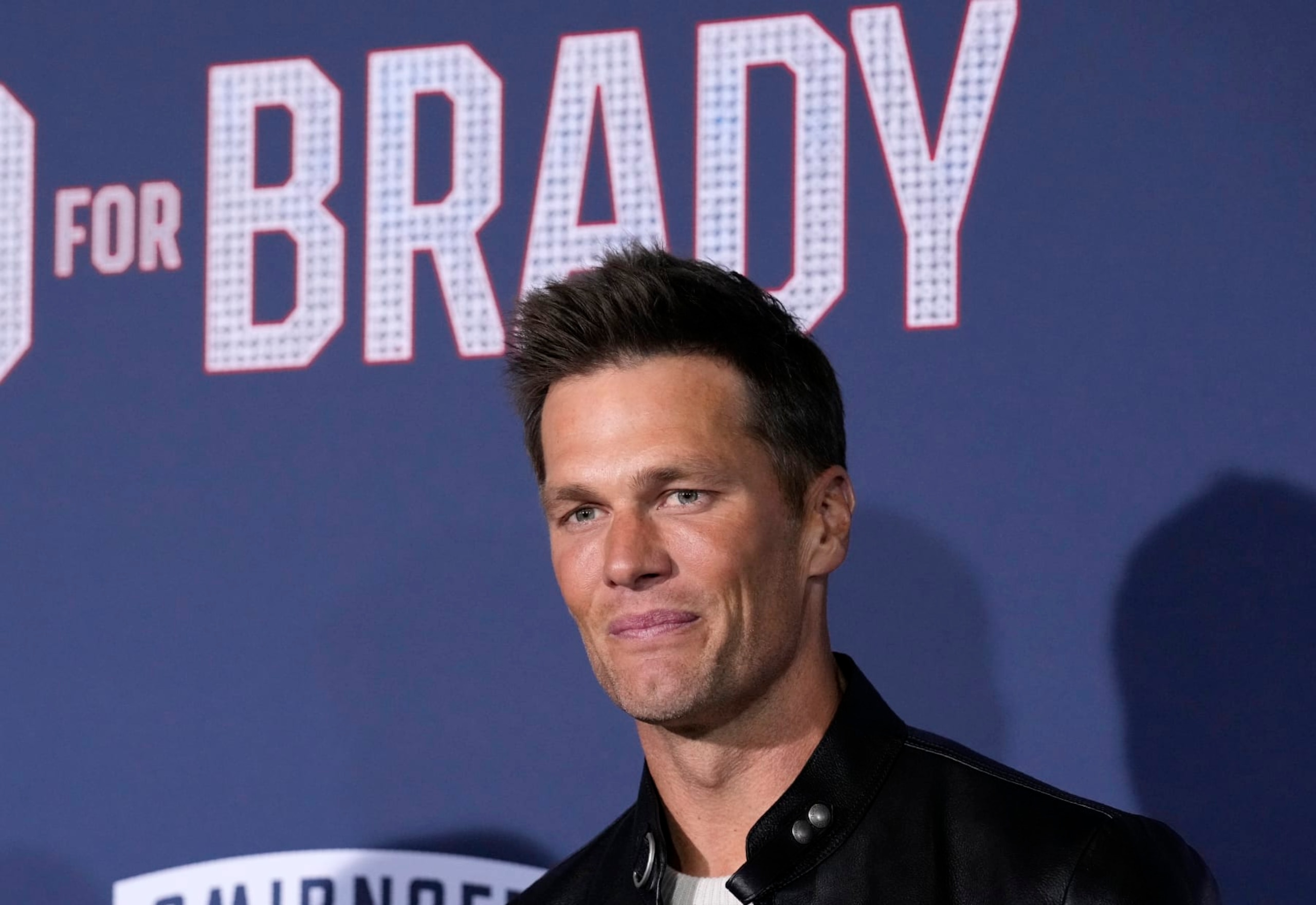 NFL quarterback Tom Brady, a cast member and producer of "80 for Brady," poses at the premiere of the film, Tuesday, Jan. 31, 2023, at the Regency Village Theatre in Los Angeles. (AP Photo/Chris Pizzello)