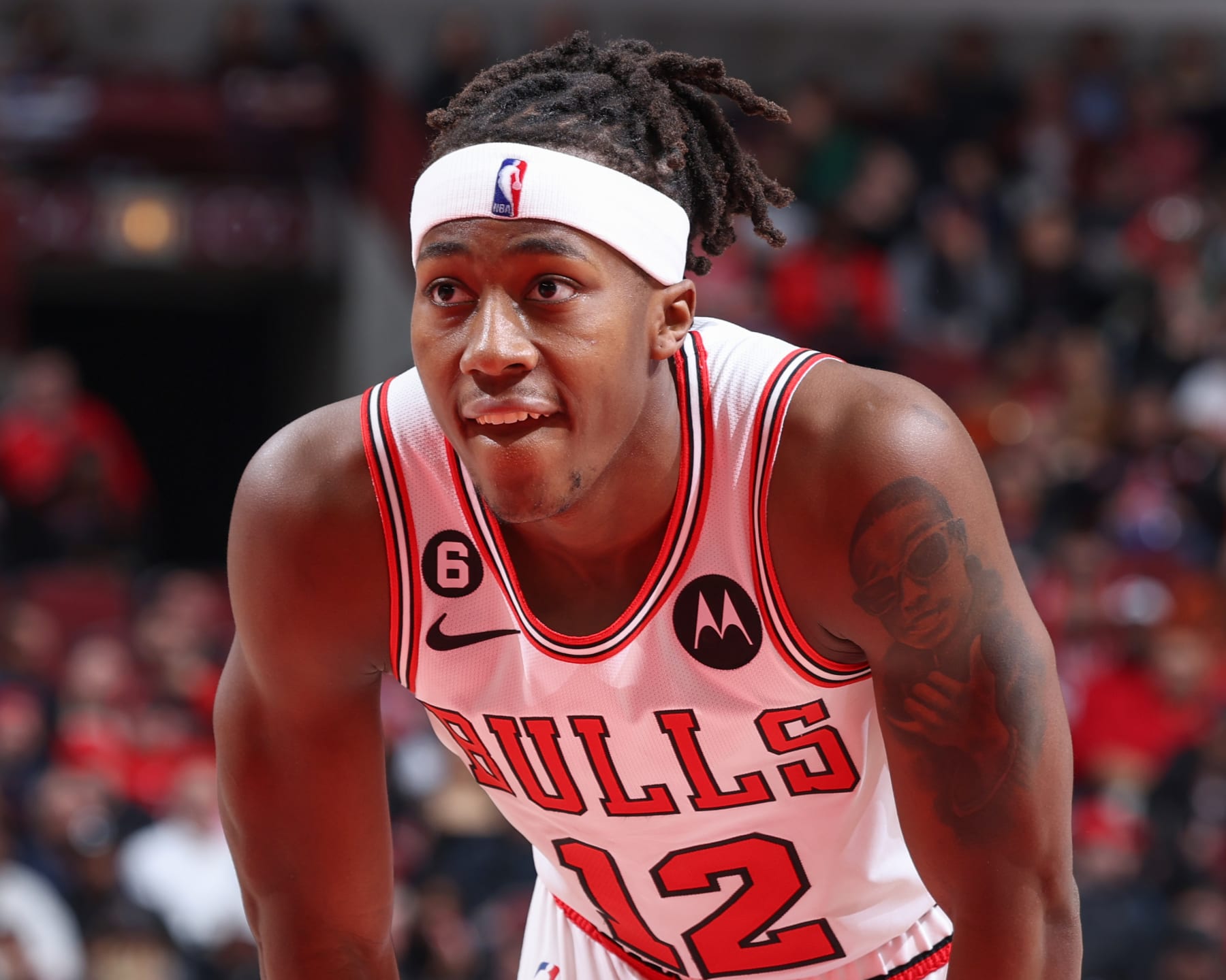 CHICAGO, IL - MARCH 21:  Ayo Dosunmu #12 of the Chicago Bulls looks on during the game on March 21, 2023 at United Center in Chicago, Illinois. NOTE TO USER: User expressly acknowledges and agrees that, by downloading and or using this photograph, User is consenting to the terms and conditions of the Getty Images License Agreement. Mandatory Copyright Notice: Copyright 2023 NBAE (Photo by Jeff Haynes/NBAE via Getty Images)