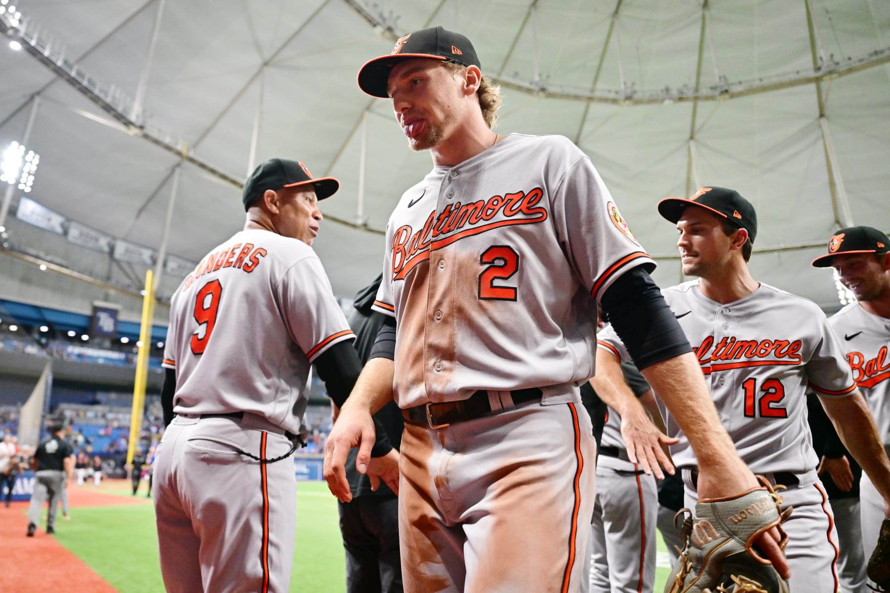 ST PETERSBURG, FLORIDA - JULY 20: Gunnar Henderson #2 of the Baltimore Orioles celebrates with teammates after defeating the Tampa Bay Rays 4-3 at Tropicana Field on July 20, 2023 in St Petersburg, Florida. (Photo by Julio Aguilar/Getty Images)