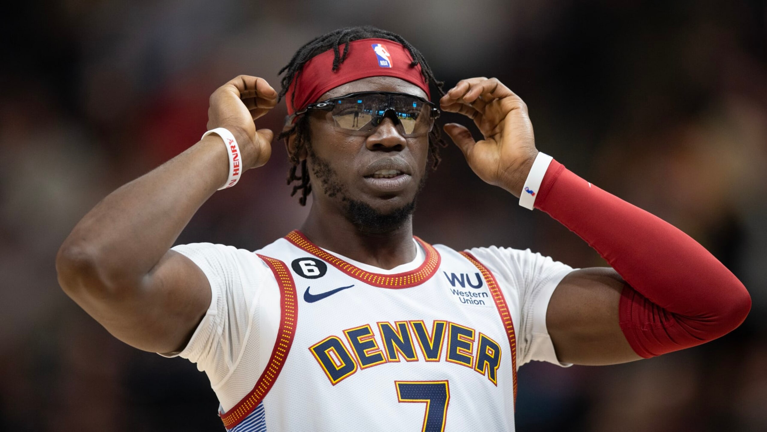SALT LAKE CITY UT- APRIL 8 :  Reggie Jackson #7 of the Denver Nuggets adjusts his glasses during the first half of their game against the Utah Jazz April 8, 2023 at the Vivint Arena  in Salt Lake City Utah. NOTE TO USER: User expressly acknowledges and agrees that, by downloading and using this photograph, User is consenting to the terms and conditions of the Getty Images License Agreement(Photo by Chris Gardner/ Getty Images)
